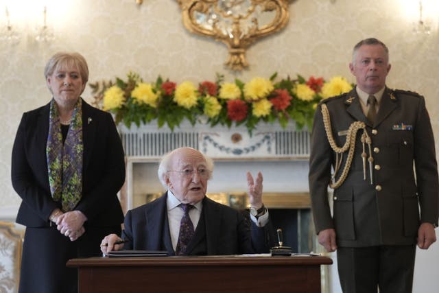 President Michael D Higgins speaks after signing a Presidential pardon for Sylvester Poff and James Barrett at Aras an Uachtarain in Dublin. Poff and Barrett were executed in Tralee Gaol in 1883 after being wrongfully convicted of the murder of Thomas Browne in October 1882 (Brian Lawless/PA)