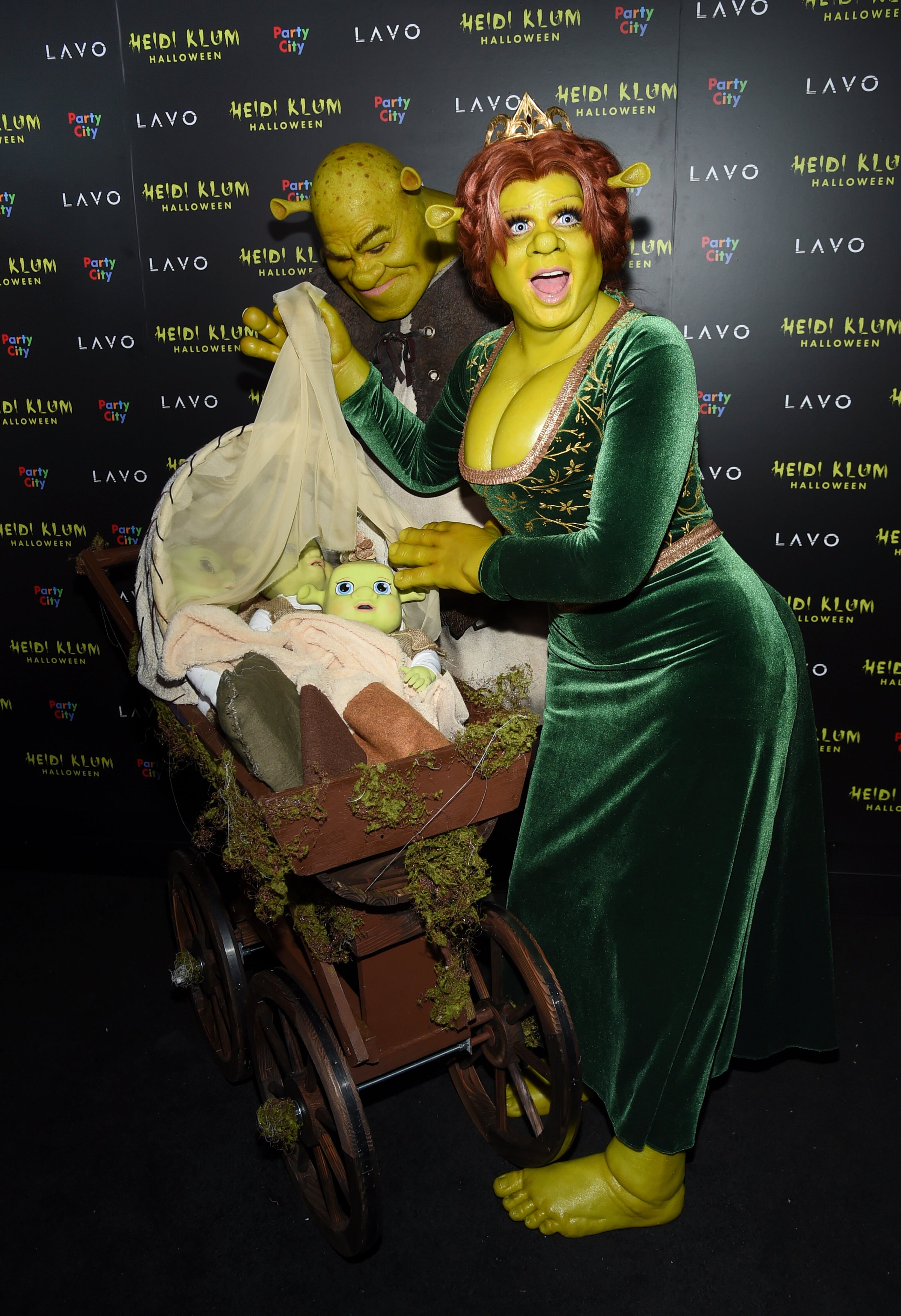 Heidi Klum, right, dressed as Princess Fiona and Tom Kaulitz dressed as Shrek arrive at Klum's 19th annual Halloween party at Lavo New York on Wednesday, Oct. 31, 2018