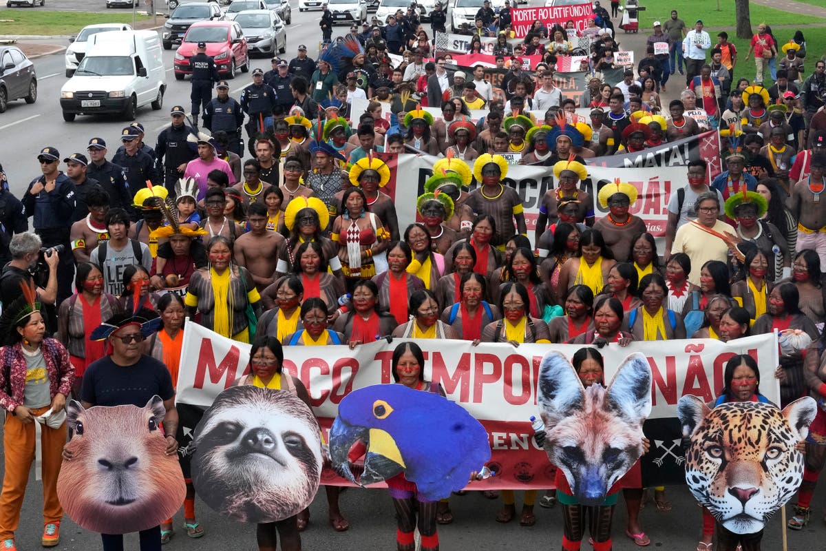 Indigenous people march in Brazil's capital against bill limiting land rights