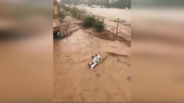<p>Spain flash floods drag cars away as roads turn into rivers.</p>