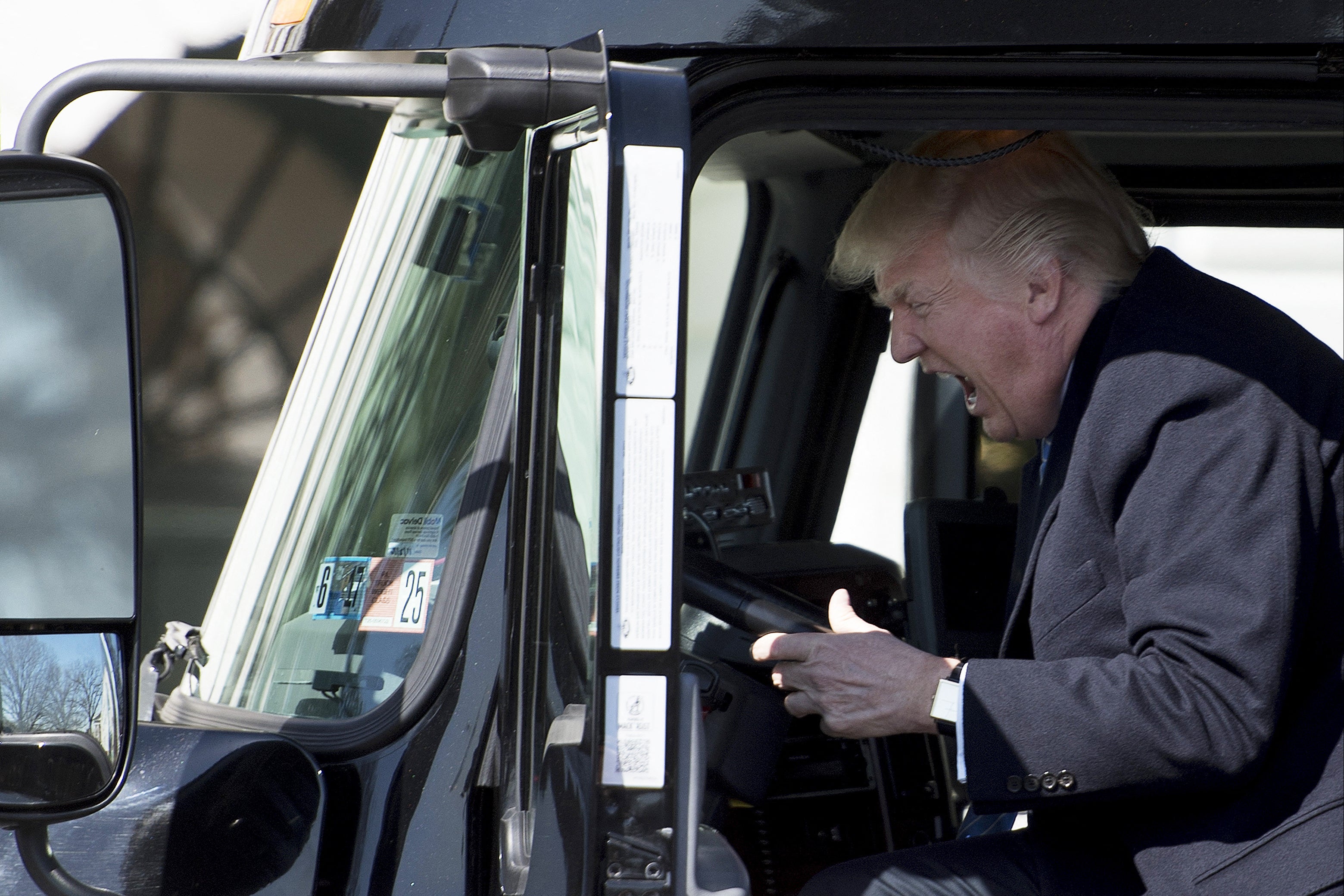 Trump is well known for loving to sit in trucks. Here he is pictured in the driver’s seat of a semi-truck as he welcomes truckers and CEOs to the White House in March 23 2017, ostensibly to discuss healthcare