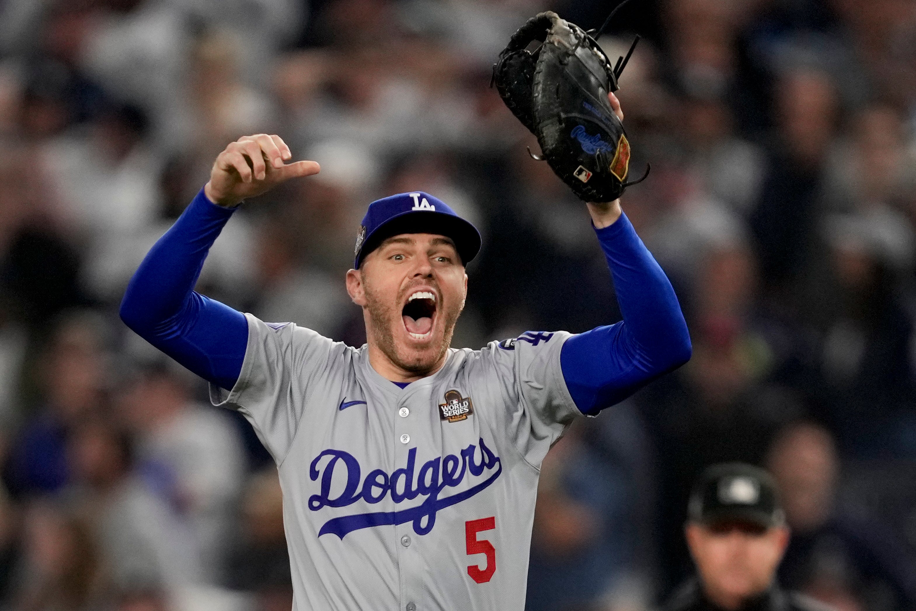 Los Angeles Dodgers first baseman Freddie Freeman celebrates their win against the New York Yankees (Ashley Landis/AP)