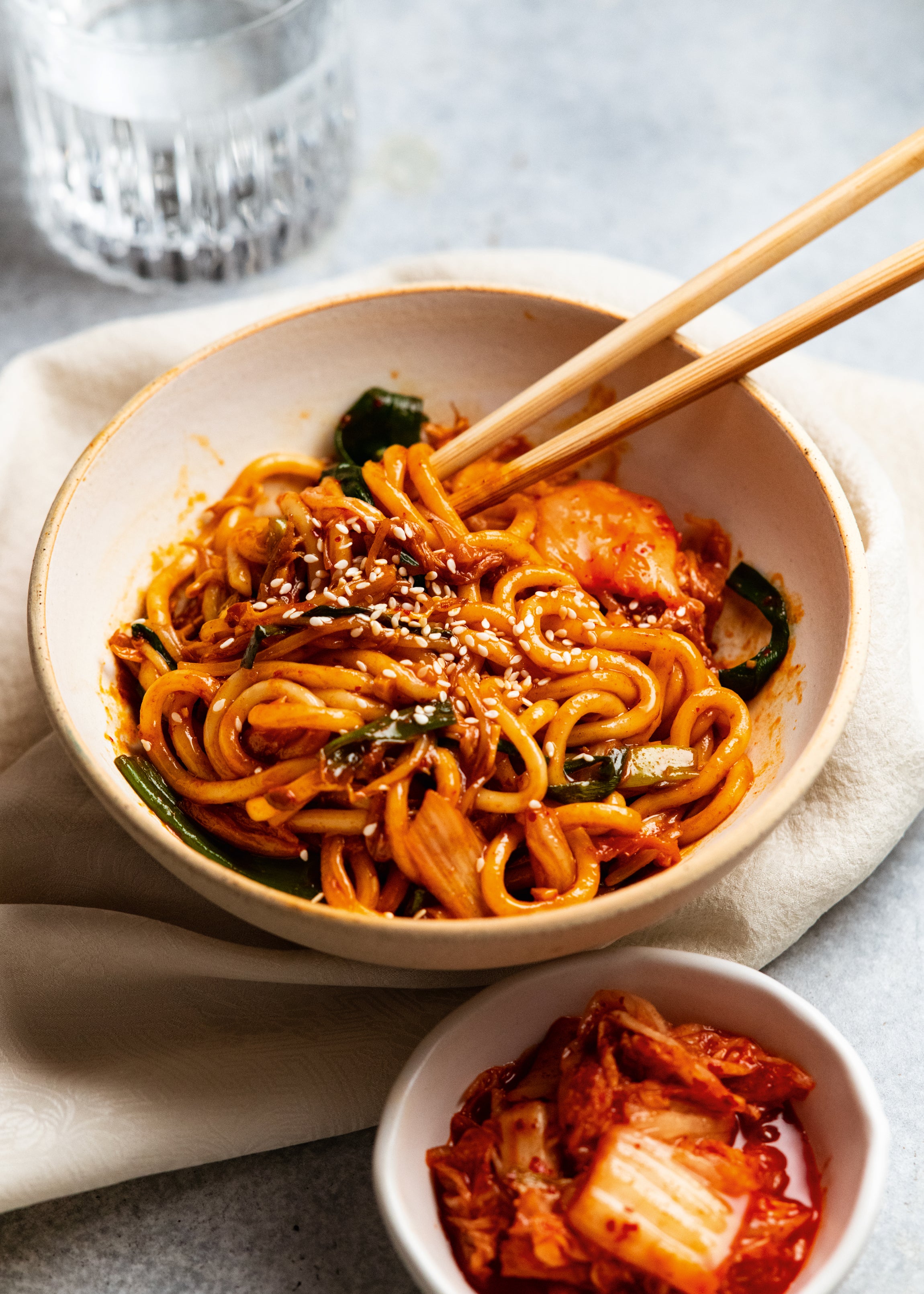 A quick, flavourful bowl of stir-fried udon with kimchi and gochujang for an umami-packed, spicy kick