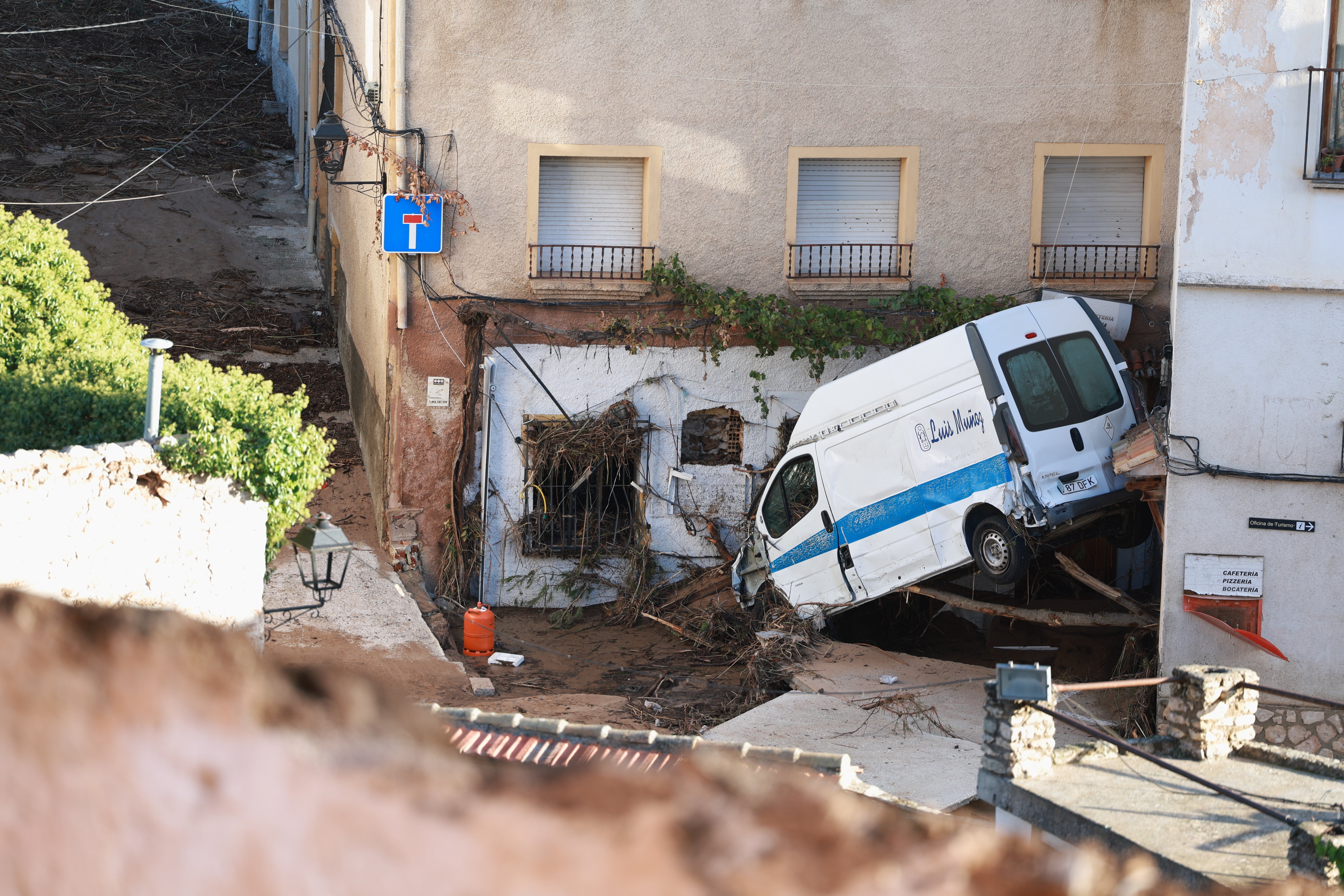 View of a damaged vehicle in the flood-affected Municipality of Letur,