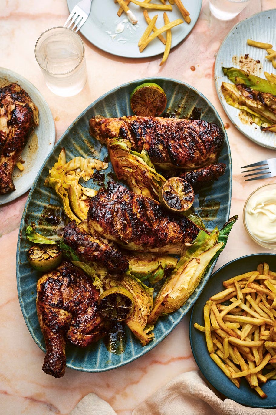 Roast chicken with a DIY twist – yes, that’s a brick, and no, you won’t regret it. Expect charred skin and a spicy cabbage sidekick that’s worth every bit of mess