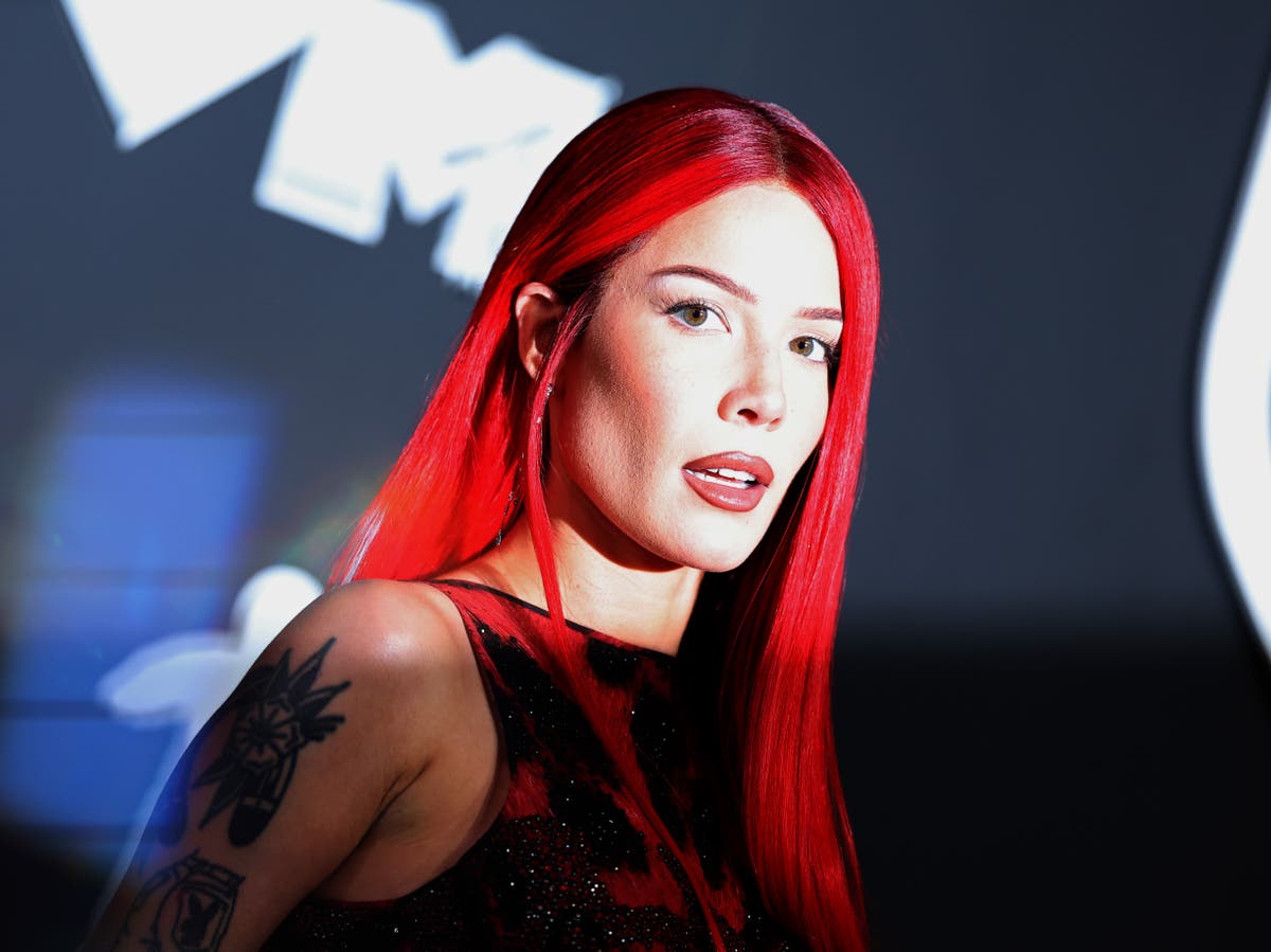 Halsey claims ‘really powerful’ music executive went through nudes without consent