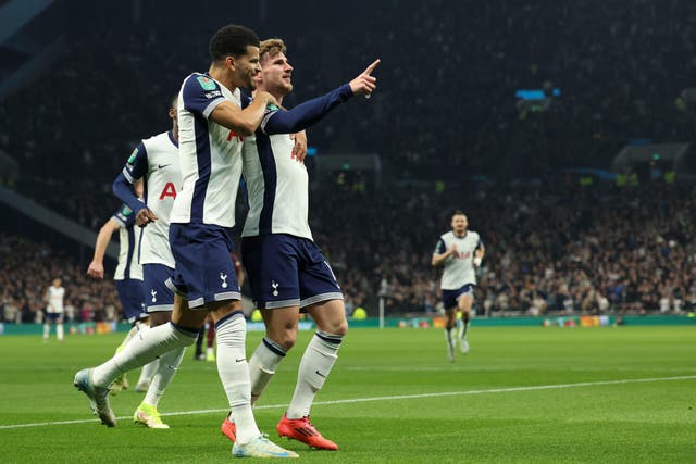 Timo Werner, right, celebrates after scoring for Tottenham against Manchester City (Ian Walton/AP/PA)