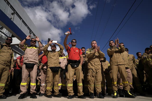 <p>Hundreds of seasonal firefighters attend a protest outside Greece’s Civil Protection Ministry </p>