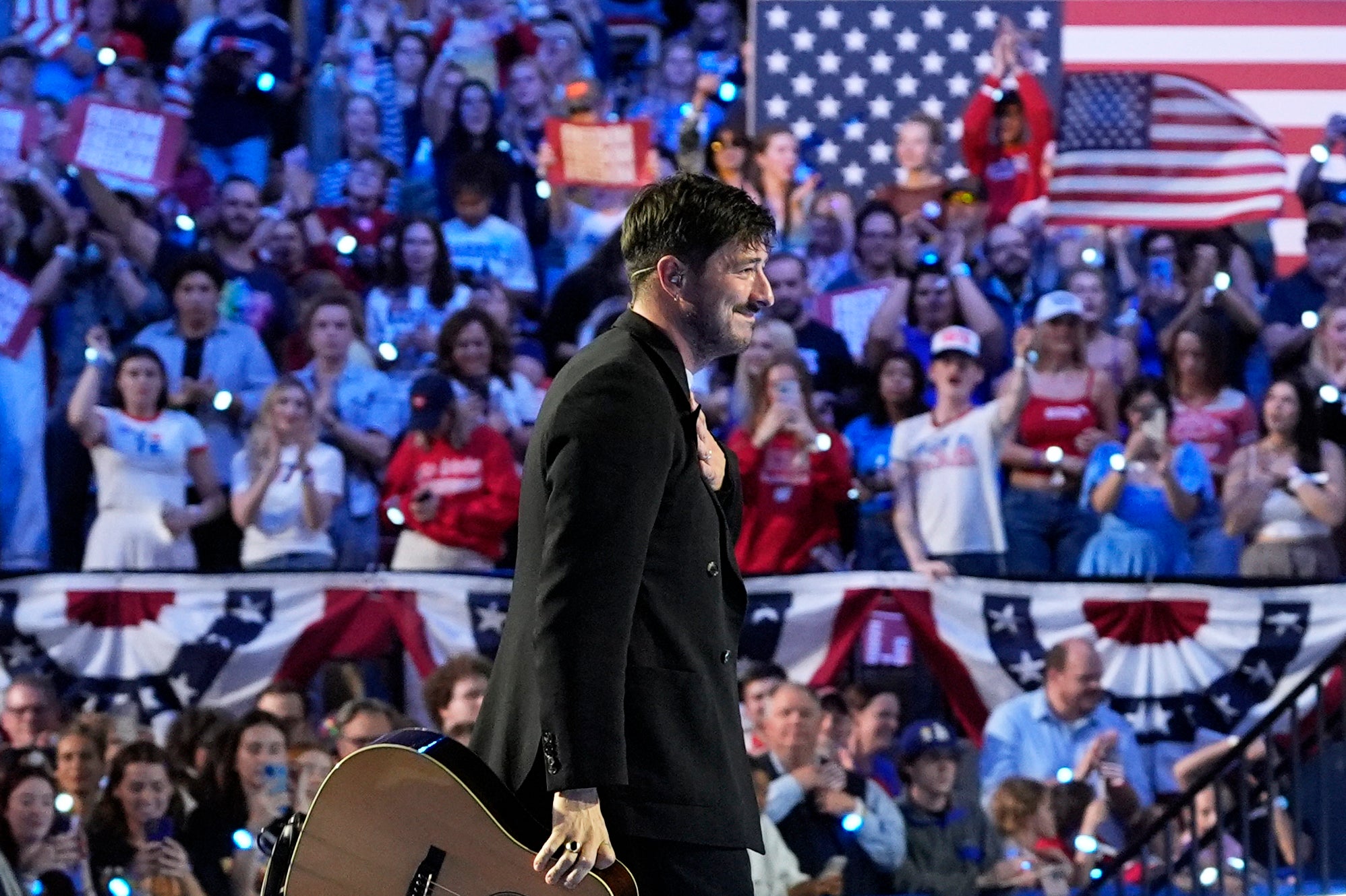 Marcus Mumford of Mumford & Sons at a campaign rally for Democratic presidential nominee Vice President Kamala Harris at the Alliant Energy Center in Madison