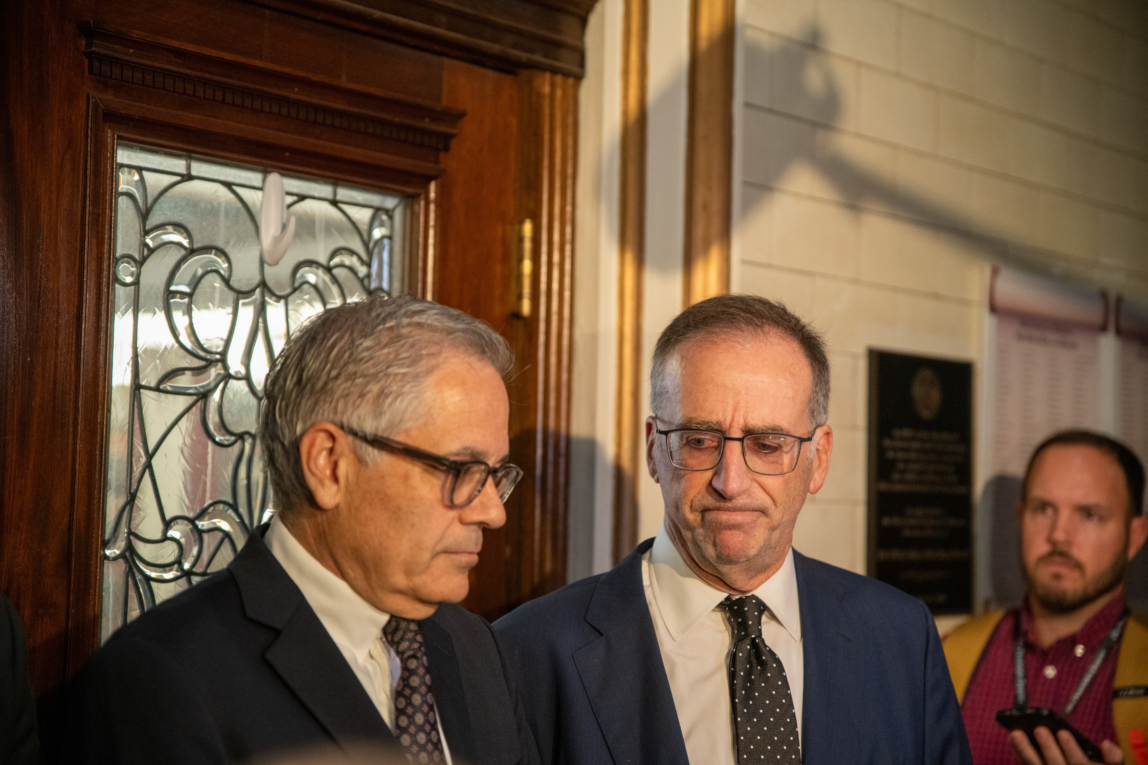 Philadelphia District Attorney Larry Krasner, left, and attorney John Summers speak to reporters on October 31 after Elon Musk was a no show at a mandatory court hearing.