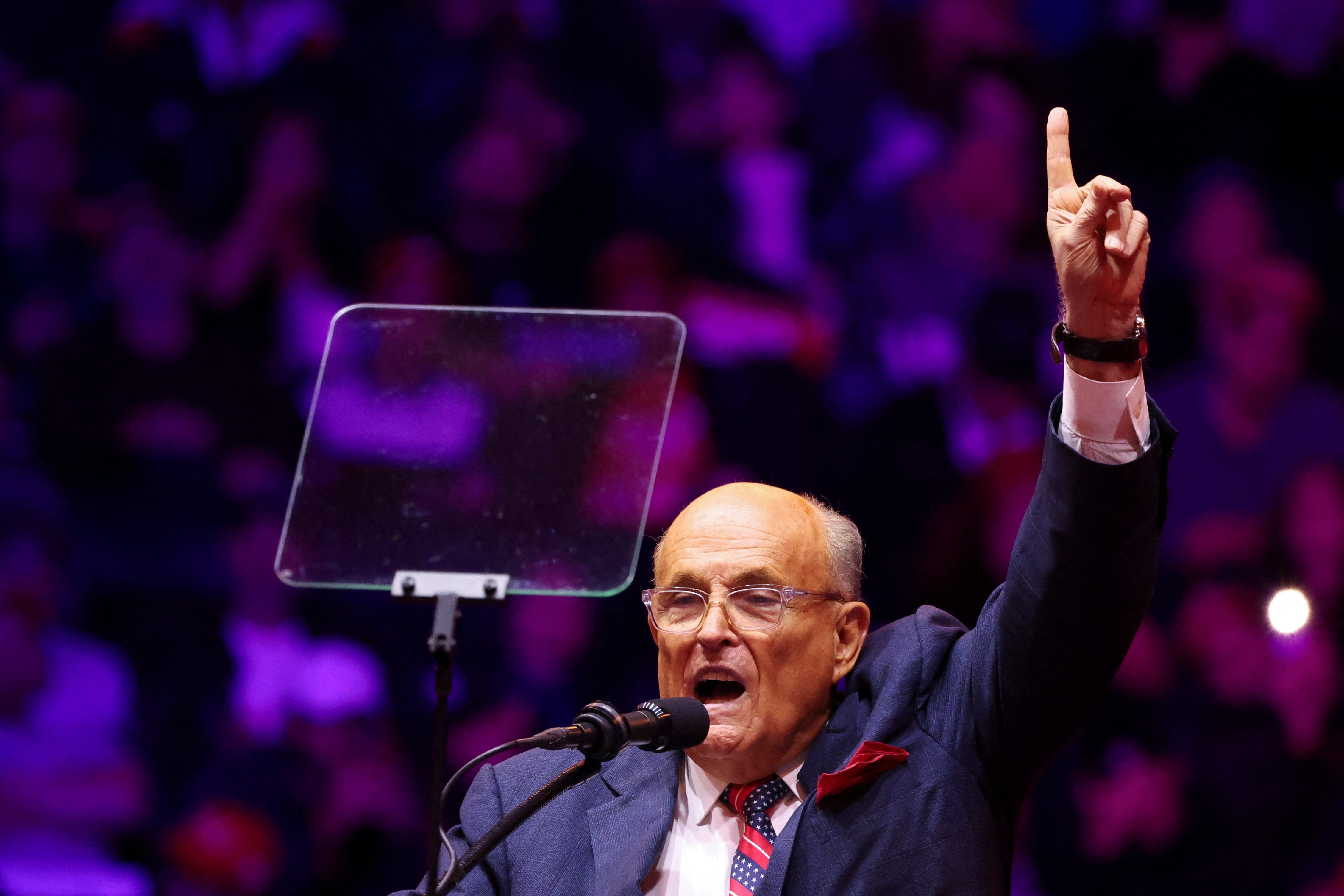 Giuliani points finger in the air during a rally for Donald Trump at Madison Square Garden, in New York, on October 27, 2024. He spoke while still owing $150 million to two election workers he defamed