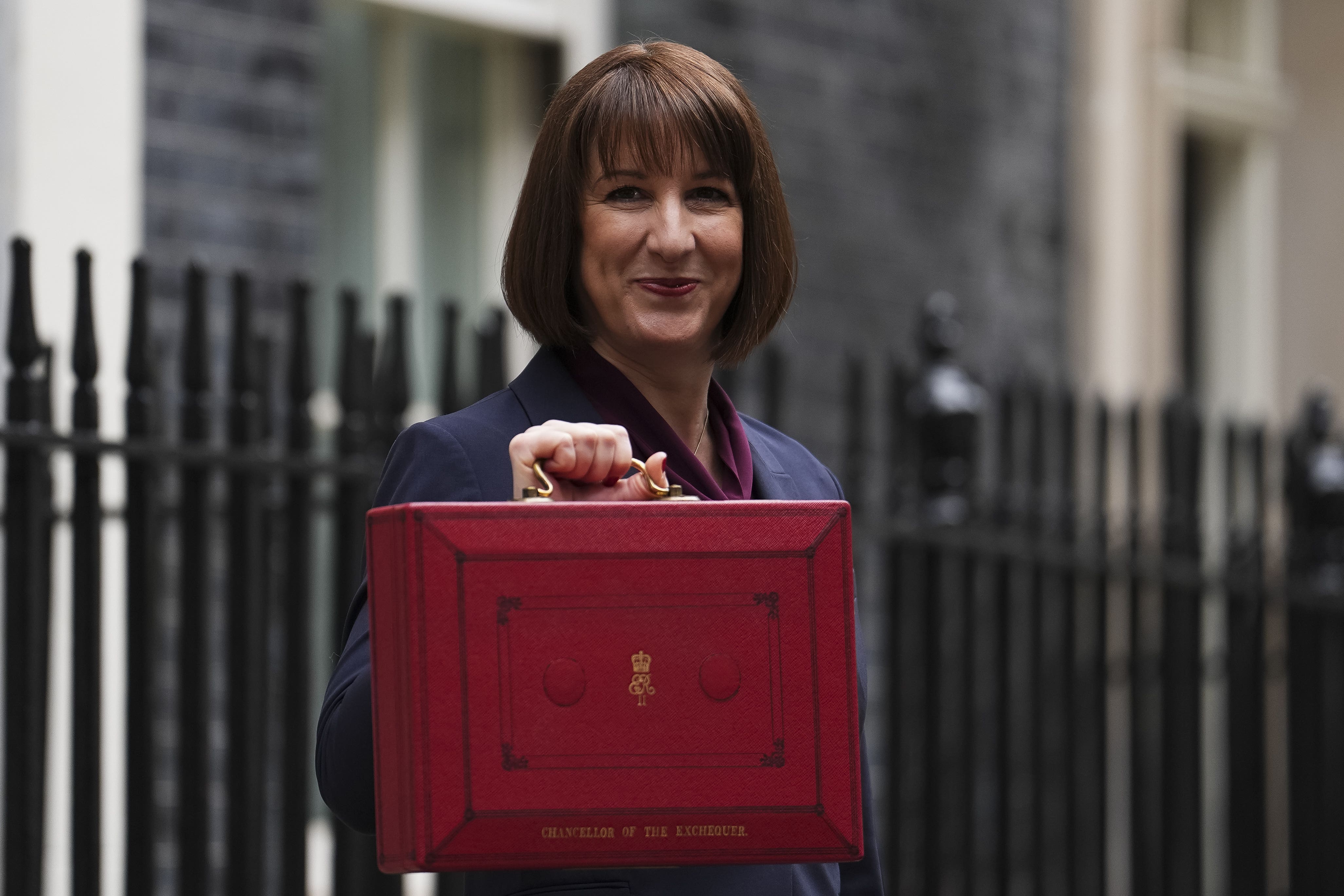 Chancellor of the Exchequer Rachel Reeves leaves 11 Downing Street, London, with her ministerial red box before delivering her Budget in the Houses of Parliament (Jordan Pettitt/PA)