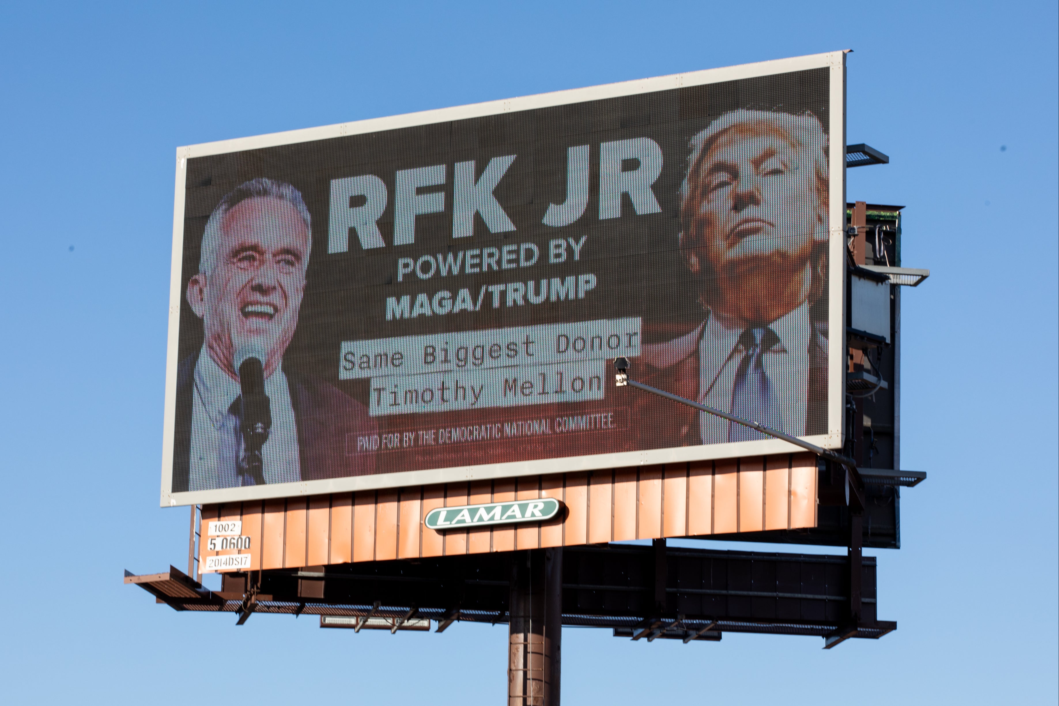 A billboard launched by the Democratic National Committee highlights how Robert F Kennedy's Super PAC was allegedly receiving millions from Trump's then largest donor, Timothy Mellon on February 9, 2024 in Grand Rapids, Michigan