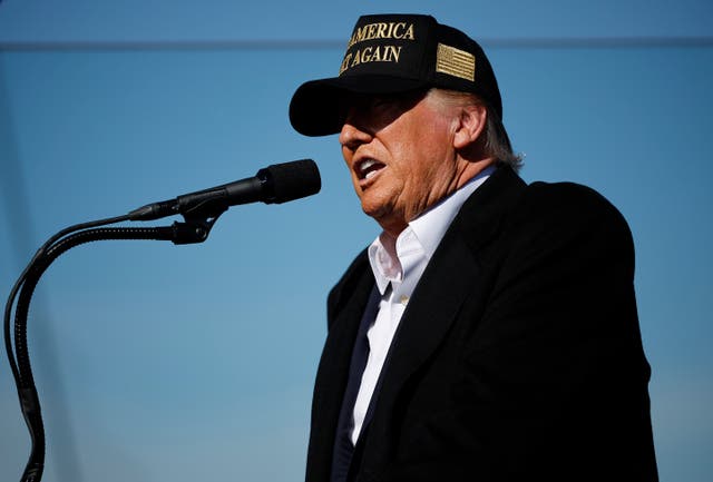 <p>Donald Trump, spealking to supporters in New Mexico on October 31, has sued CBS News, alleging election interference over its interview with Kamala Harris. </p>