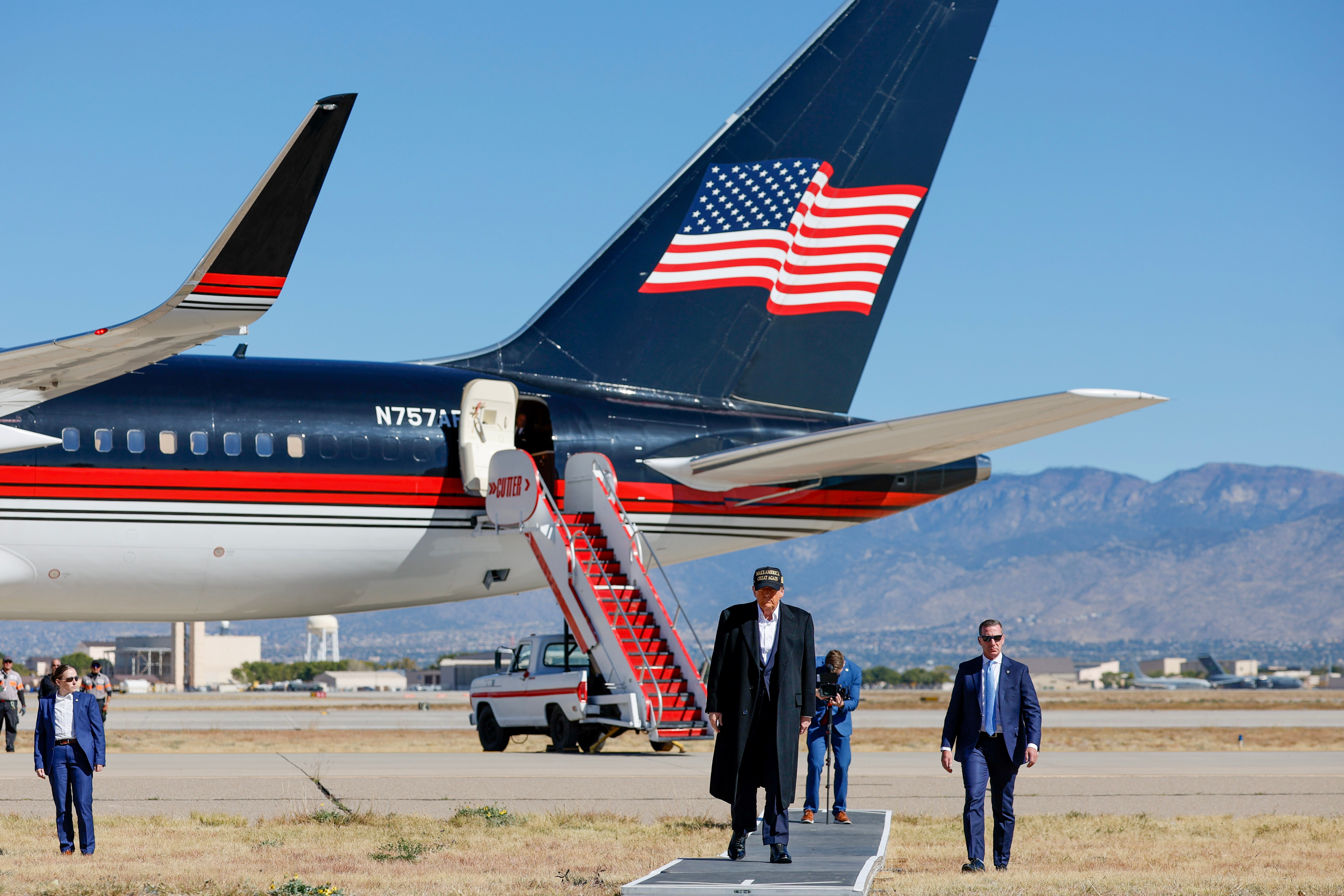 Trump arrives at a campaign rally at Albuquerque International Sunport on Halloween. His connection to his base remains strong