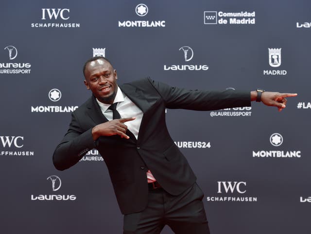 <p>Usain Bolt gives sprinter Gout Gout some words of wisdom</p>