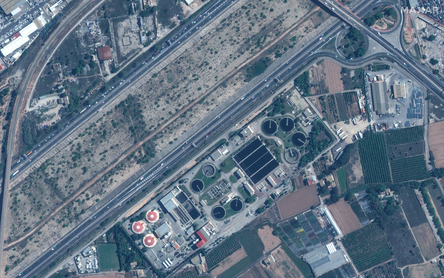 Satellite picture shows Valencia’s water treatment plant and v30 highway before deadly flash floods