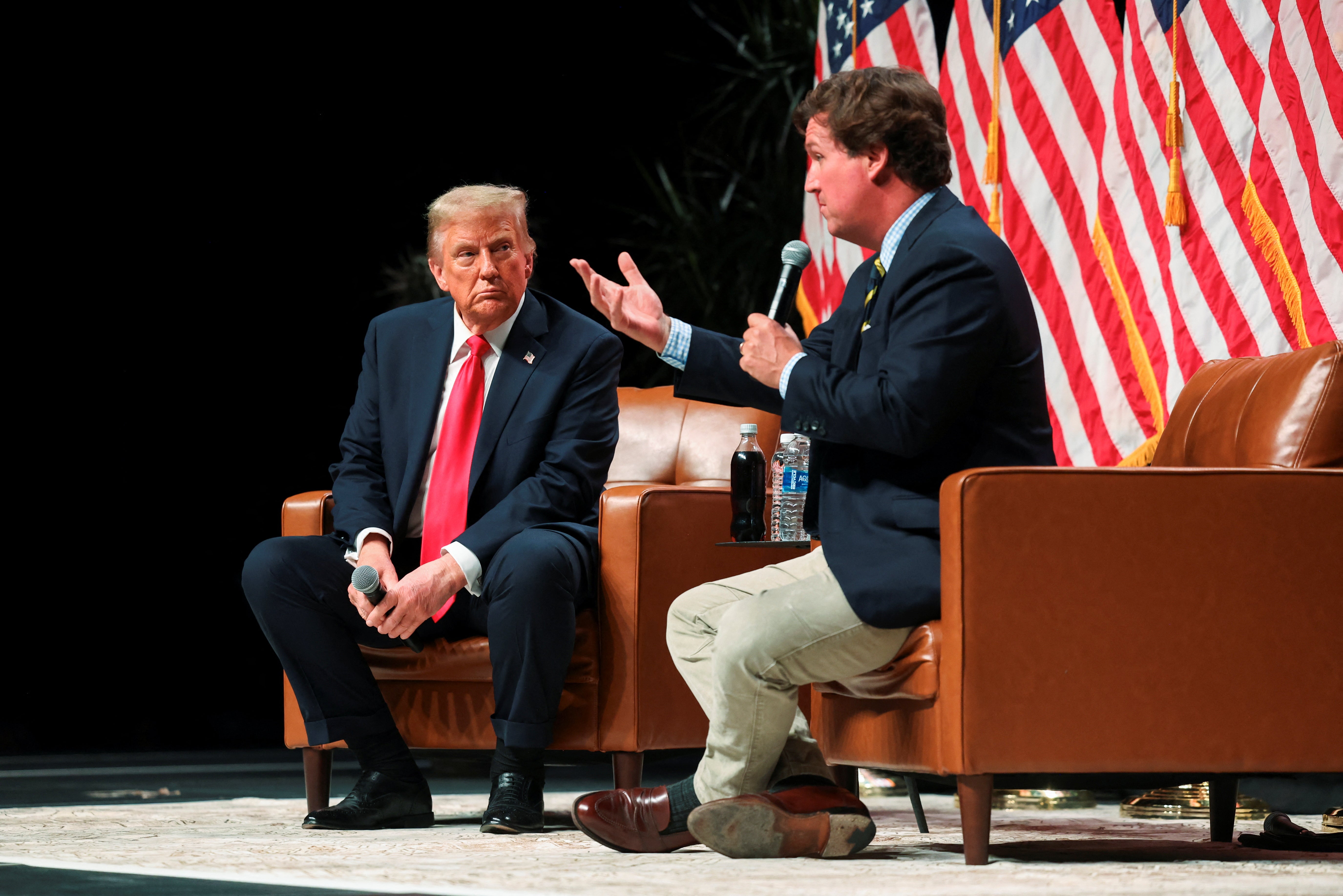 Trump talks to Tucker Carlson in Glendale, Arizona, on Thursday