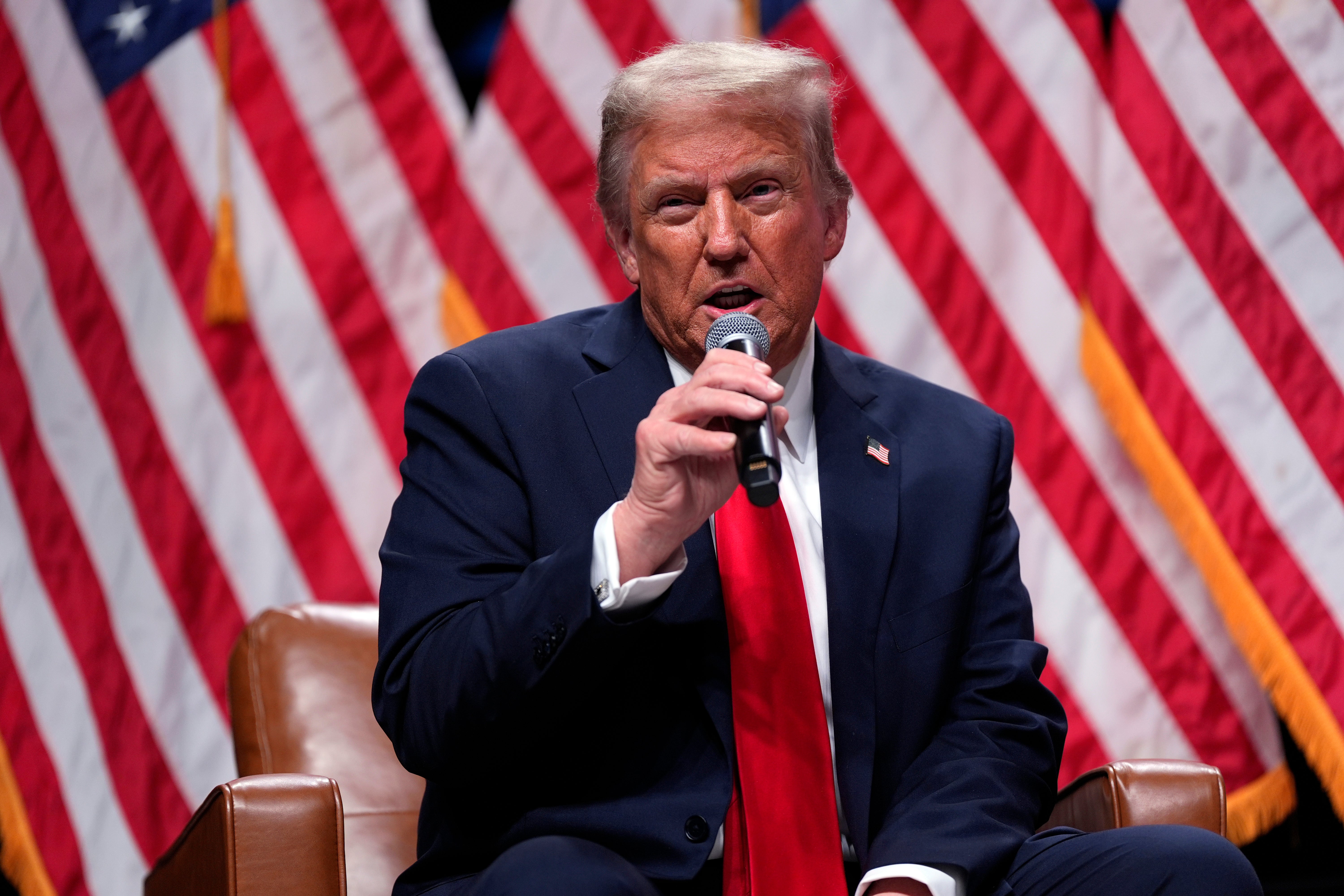 Donald Trump speaks at the Tucker Carlson Live Tour event at Desert Diamond Arena, on October 31, where he fantasized about Cheney being shot at