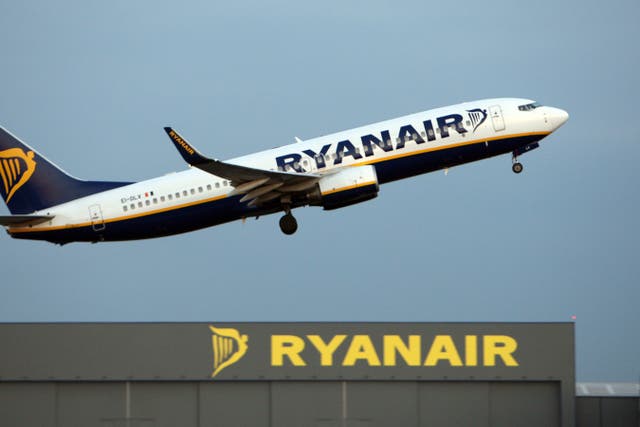 The planned Ryanair reduction could lead to as many as five million fewer passengers at UK airports (PA)