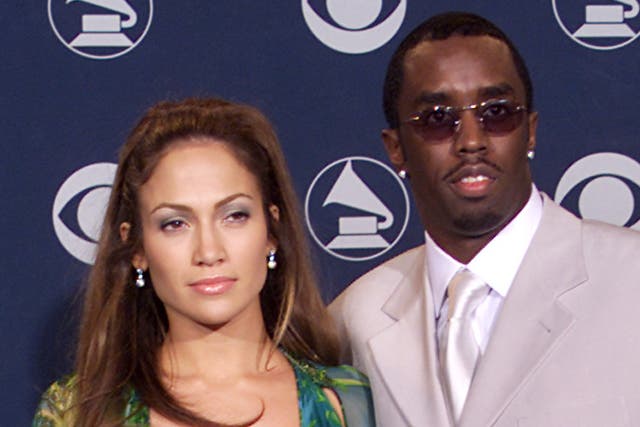 <p>Jennifer Lopez and Sean ‘Diddy’ Combs attending the 2000 Grammy Awards in Los Angeles</p>