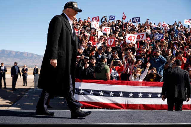 <p>Donald Trump takes the stage during a campaign rally at Albuquerque International Sunport on October 31 in Albuquerque, New Mexico</p>