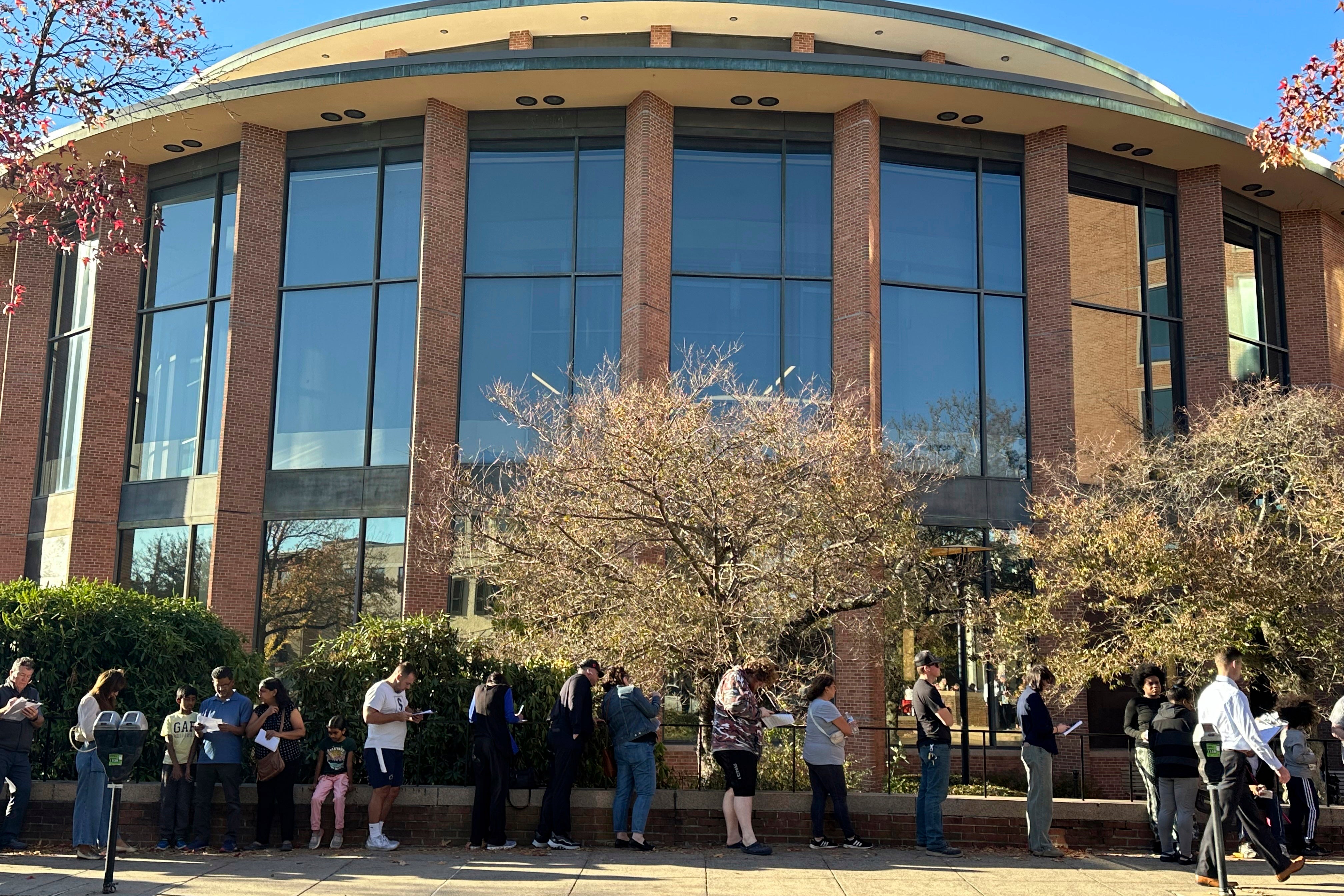 Voters line up outside the Bucks County Administration Building during early voting in the general election on Friday