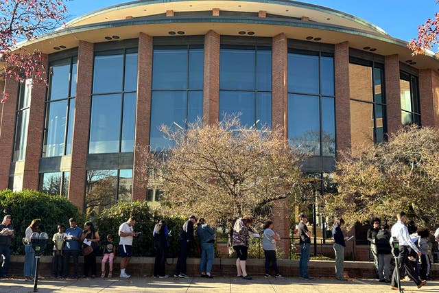 <p>Voters line up outside the Bucks County Administration Building during early voting in the general election, Friday, Nov. 1, 2024</p>