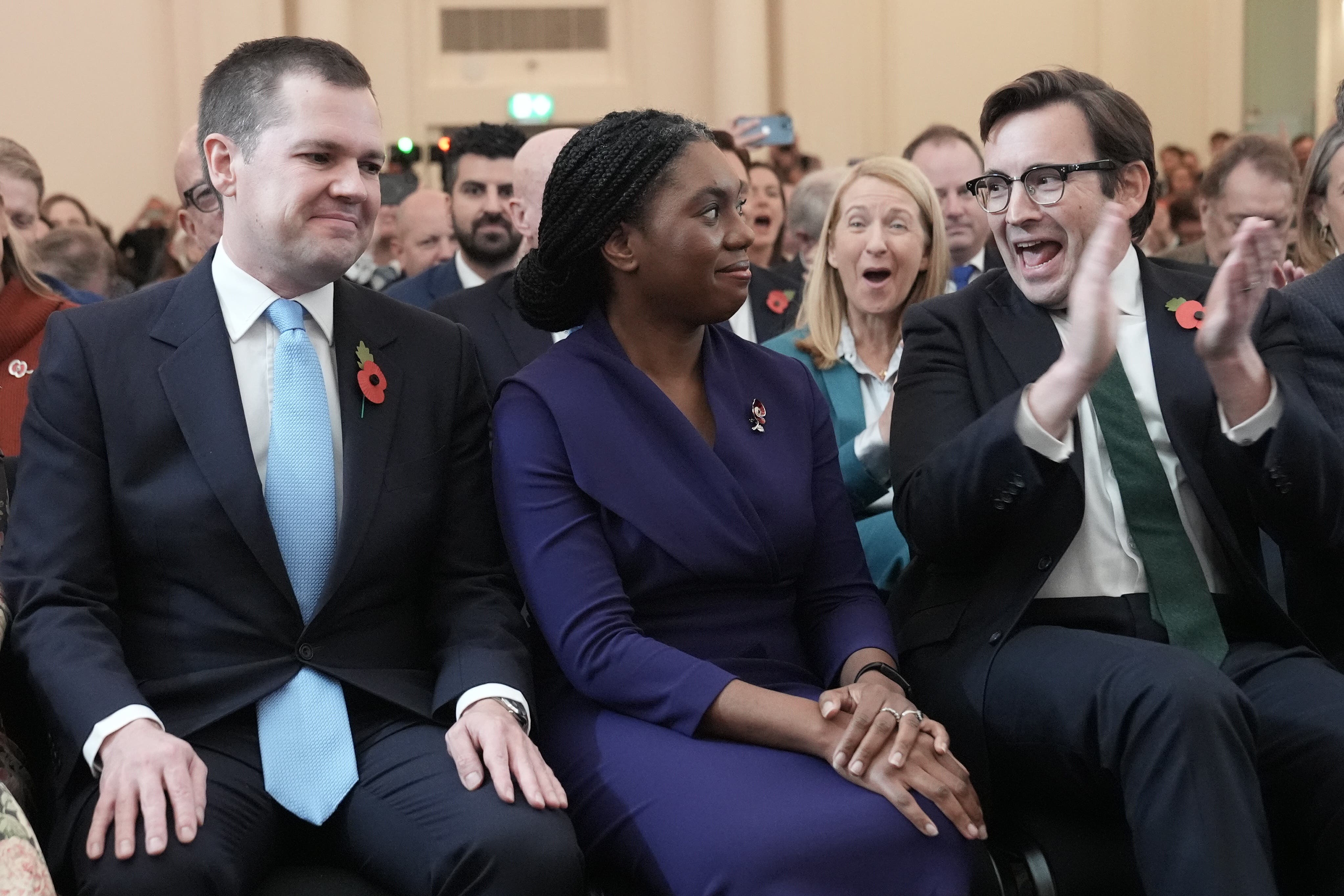 Kemi Badenoch’s husband Hamish applauds as she was announced as the new Conservative Party leader (Stefan Rousseau/PA)