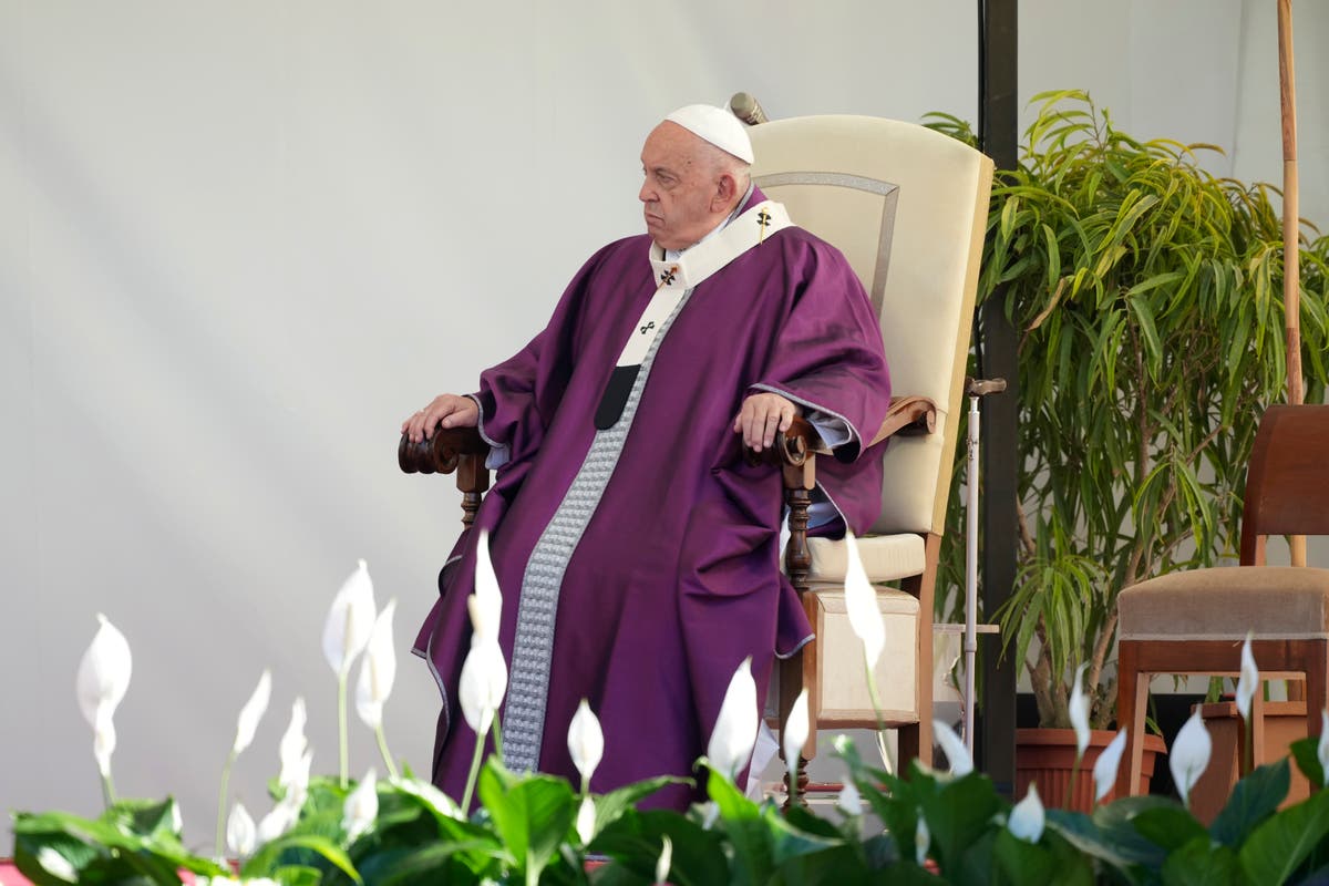 Pope Francis prays in front of graves of unborn children ahead of All