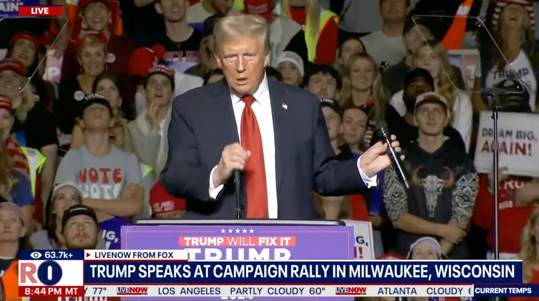 Trump appeared to make the gesture on stage during a rally in Milwaukee on Nov. 1.