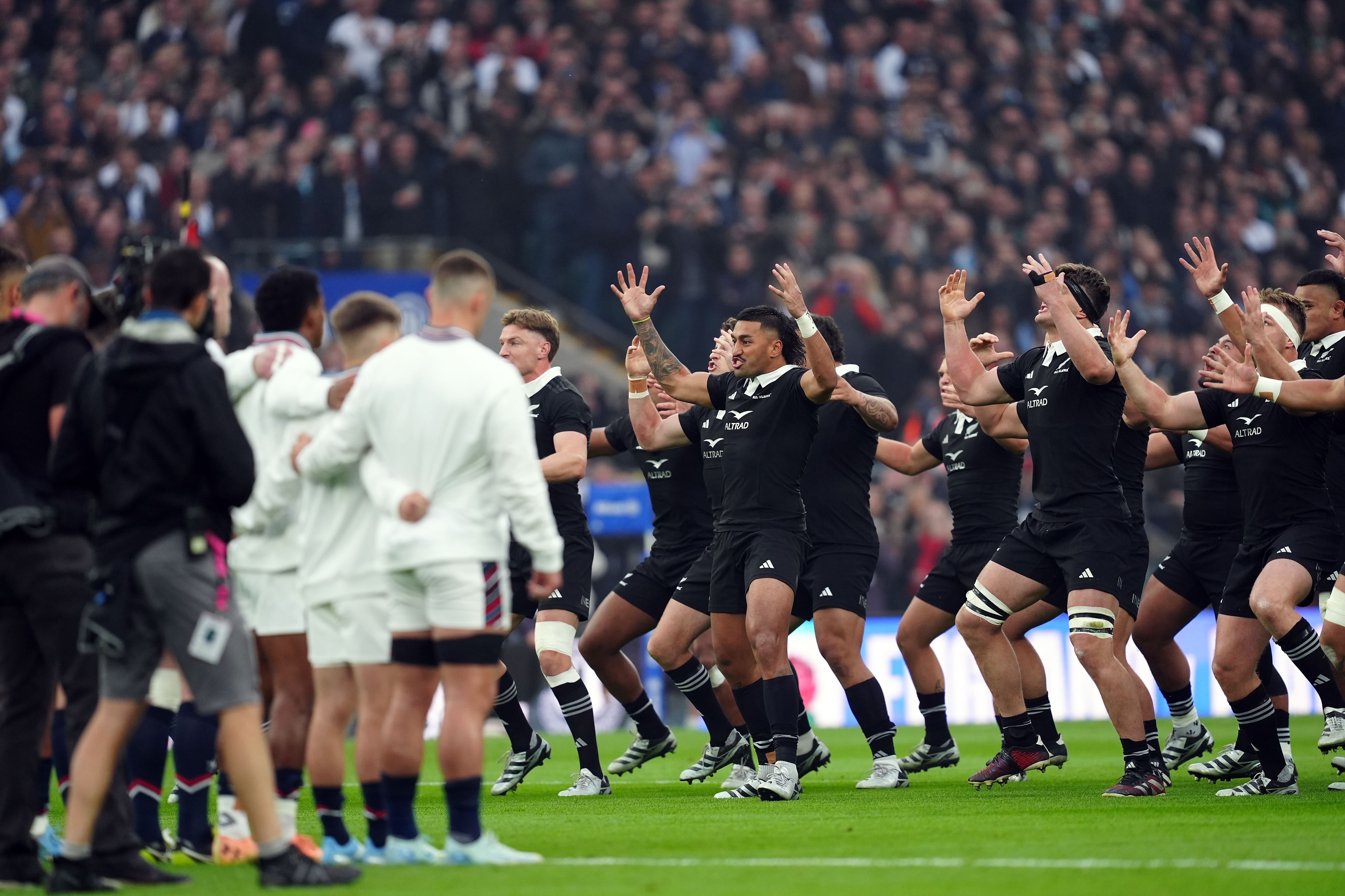 England line up on halfway as New Zealand perform the Haka (David Davies/PA)