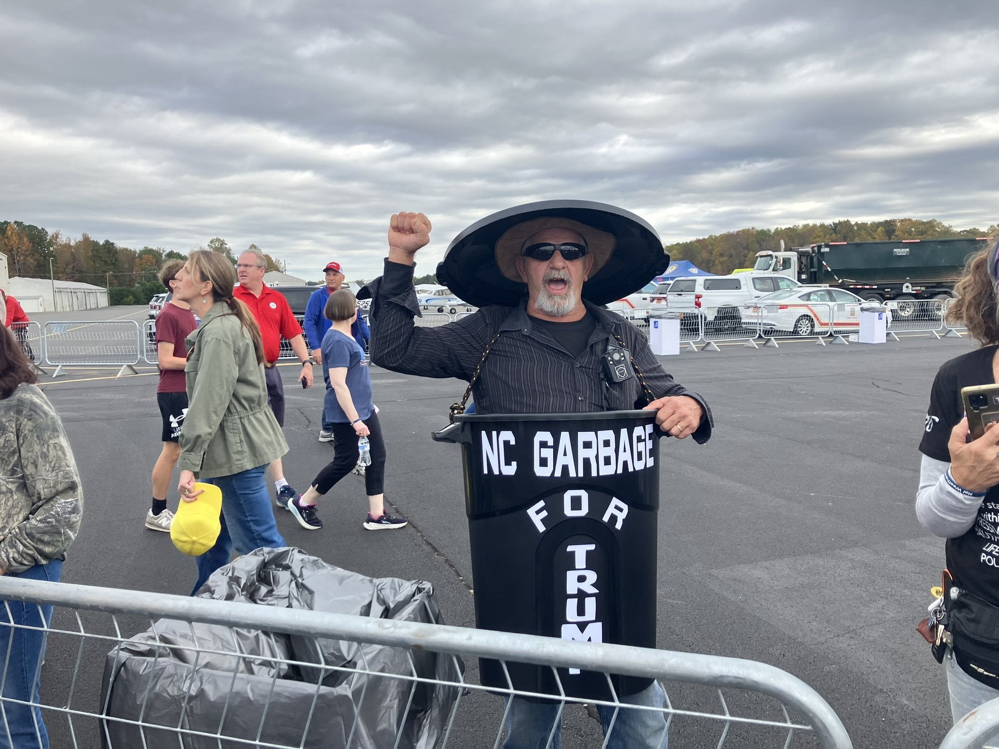 A supporter of the former president Donald Trump’s dressed in a garbage can following Joe Biden’s comments this week