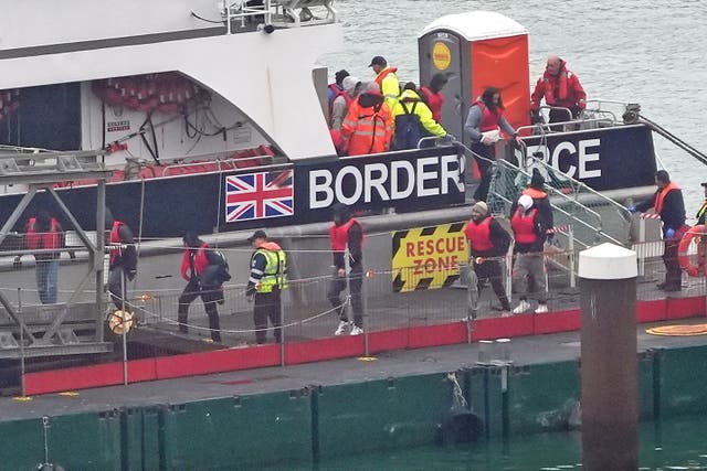 A group of people thought to be migrants are brought in to Dover, Kent (Gareth Fuller/PA)