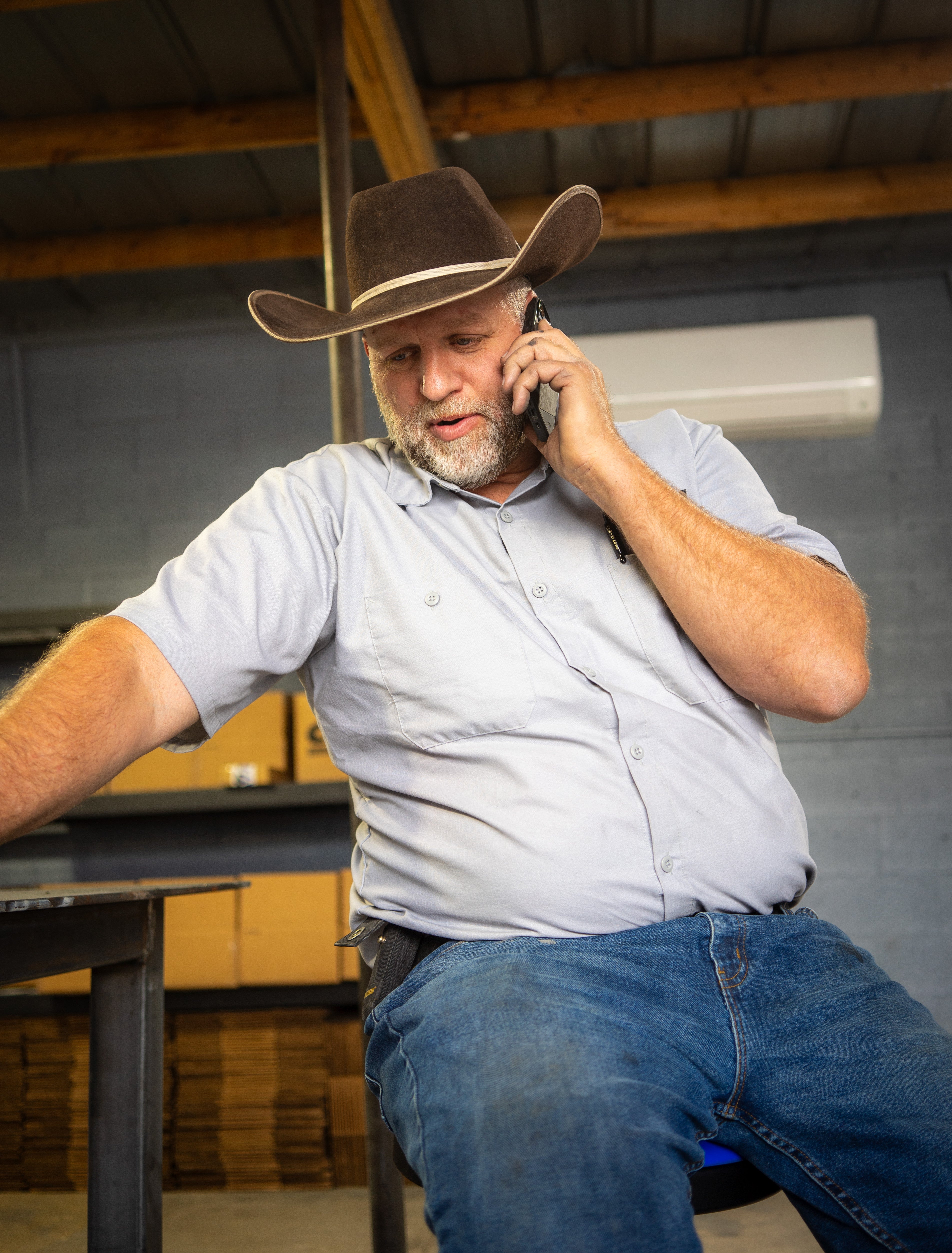 Bundy on the phone in his workspace in October, 2024