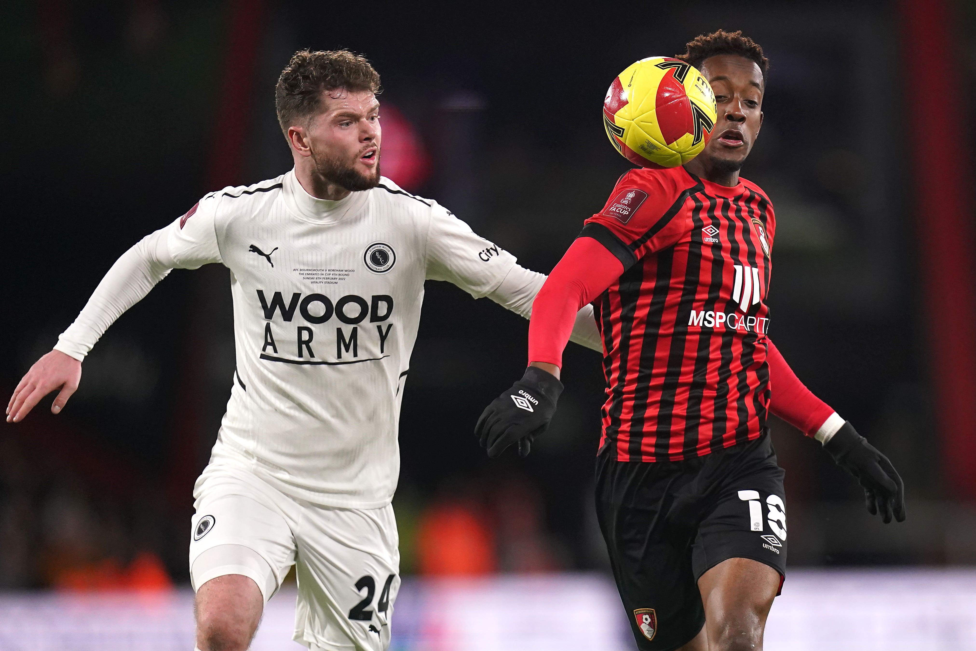 Boreham Wood’s Connor Stevens (left) with Jamal Lowe during a 1-0 win at Bournemouth in 2022 (Adam Davy/PA)