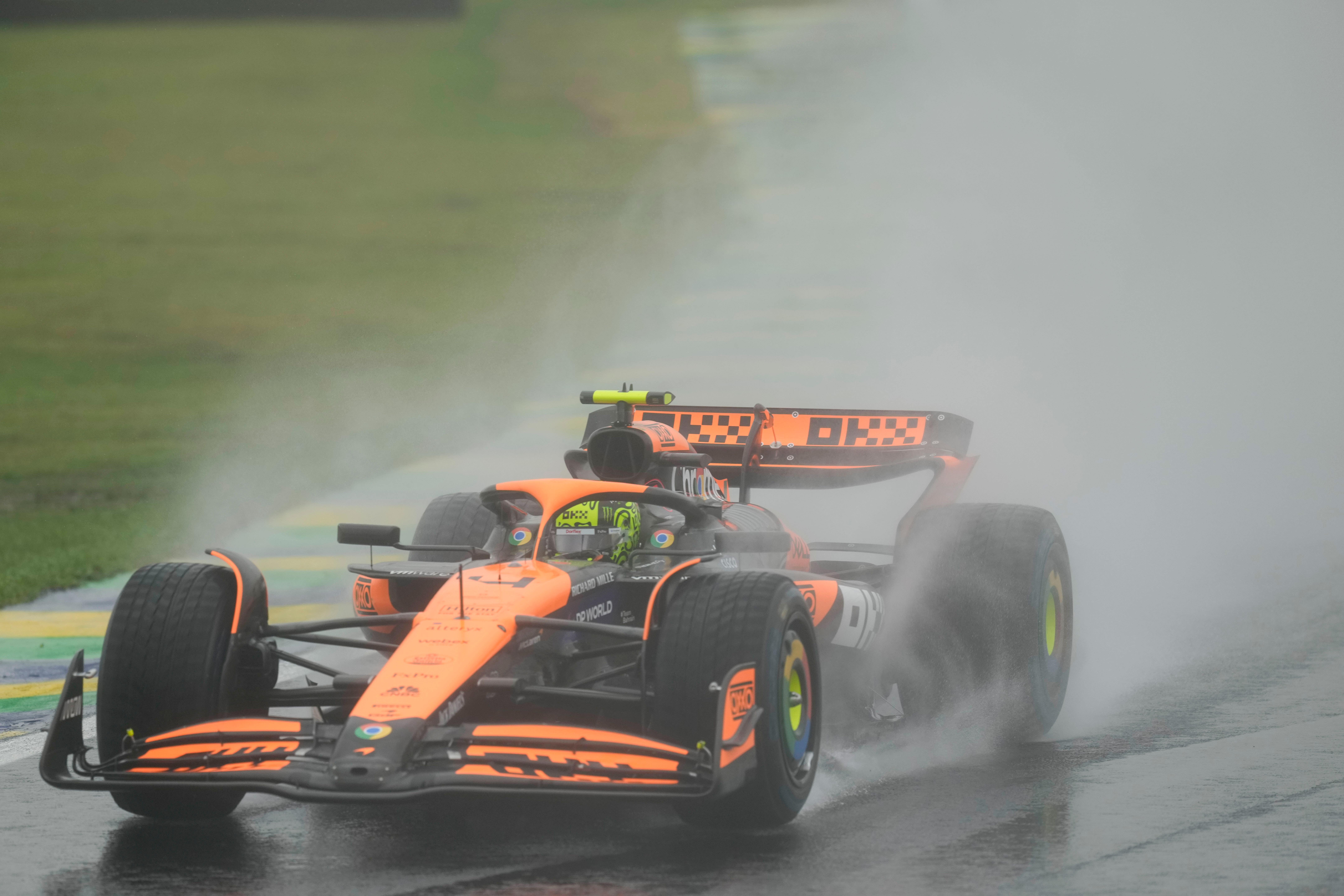 McLaren driver Lando Norris of Britain steers his car during the qualifying session ahead of the Brazilian Formula One Grand Prix at the Interlagos race track, in Sao Paulo, Brazil, Sunday, Nov. 3, 2024. (AP Photo/Andre Penner)