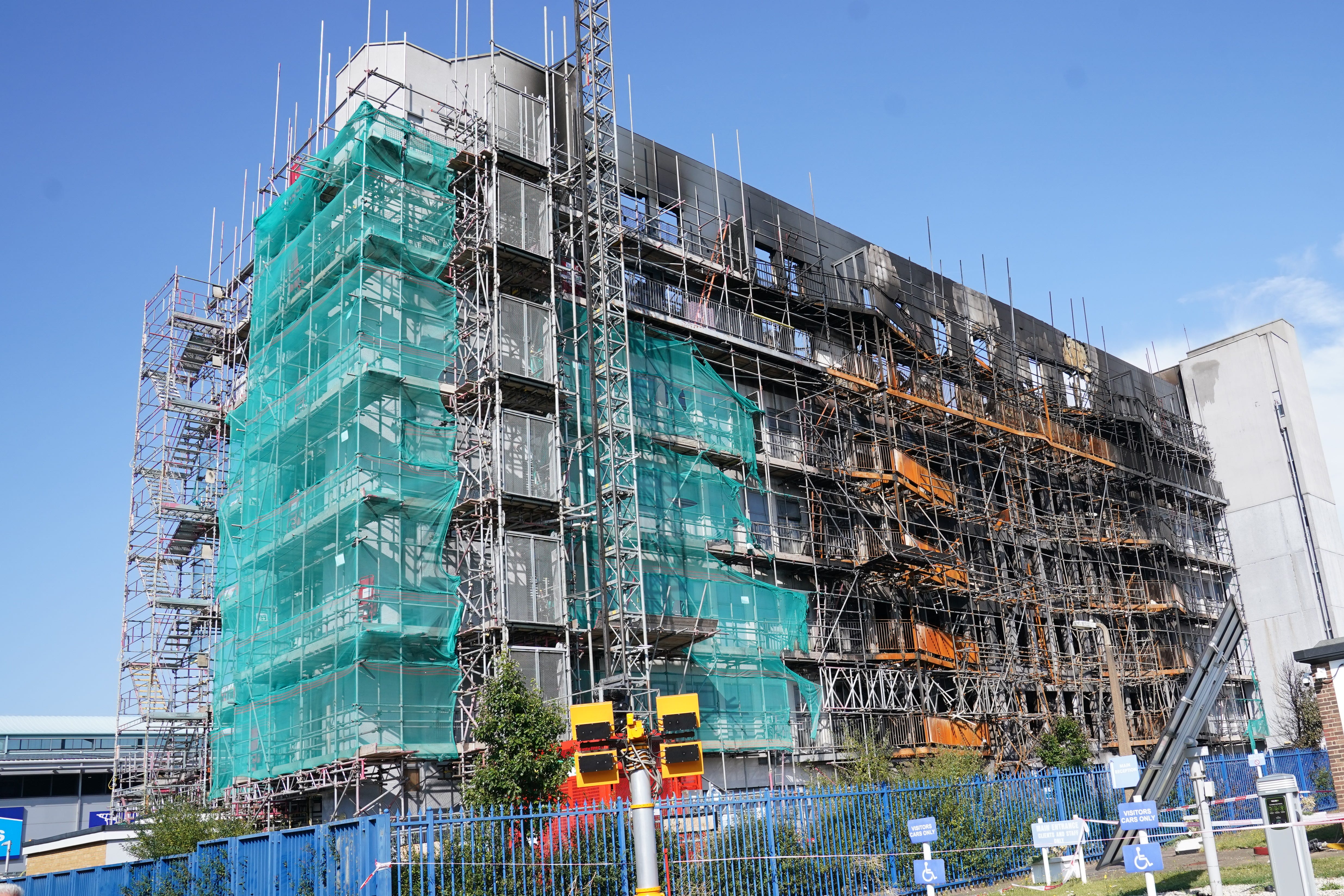 A fire broke out in August at a block of flats in east London where dangerous cladding was in the process of being removed (Stefan Rousseau/PA)