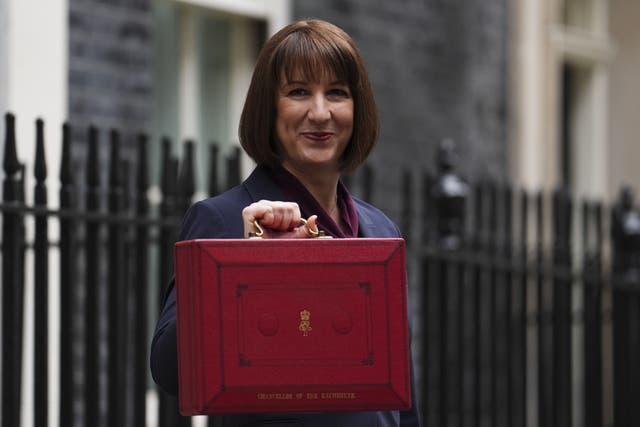 Chancellor of the Exchequer Rachel Reeves leaves 11 Downing Street, London, with her ministerial red box before delivering her Budget (Jordan Pettitt/PA)