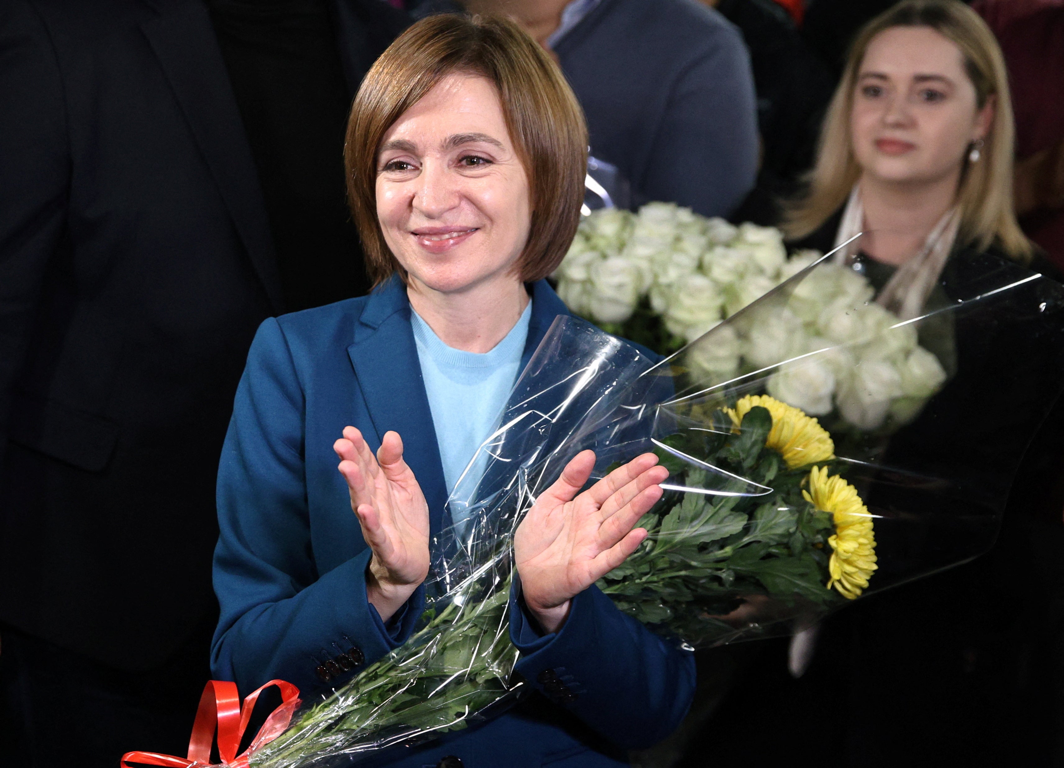 <p>Moldova’s incumbent president and presidential candidate Maia Sandu celebrates with her supporters following the announcement of the preliminary results of the second round of the presidential election, at her campaign headquarters in Chisinau, Moldova, 3 November 2024</p>