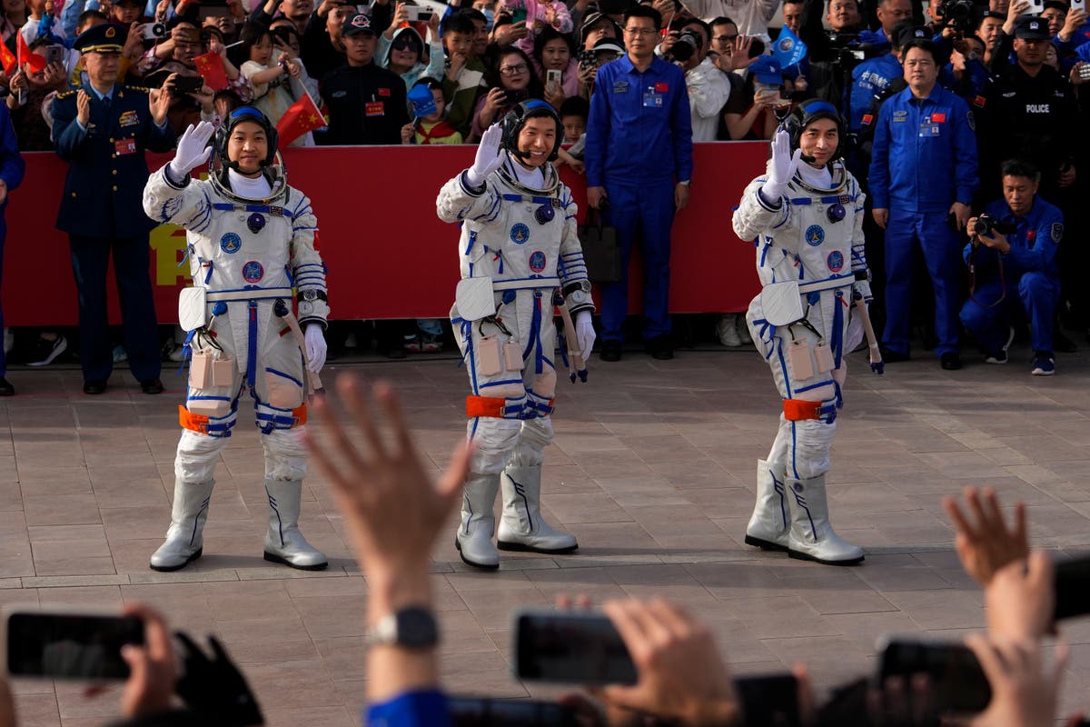 China space station crew returns to Earth after six months in space