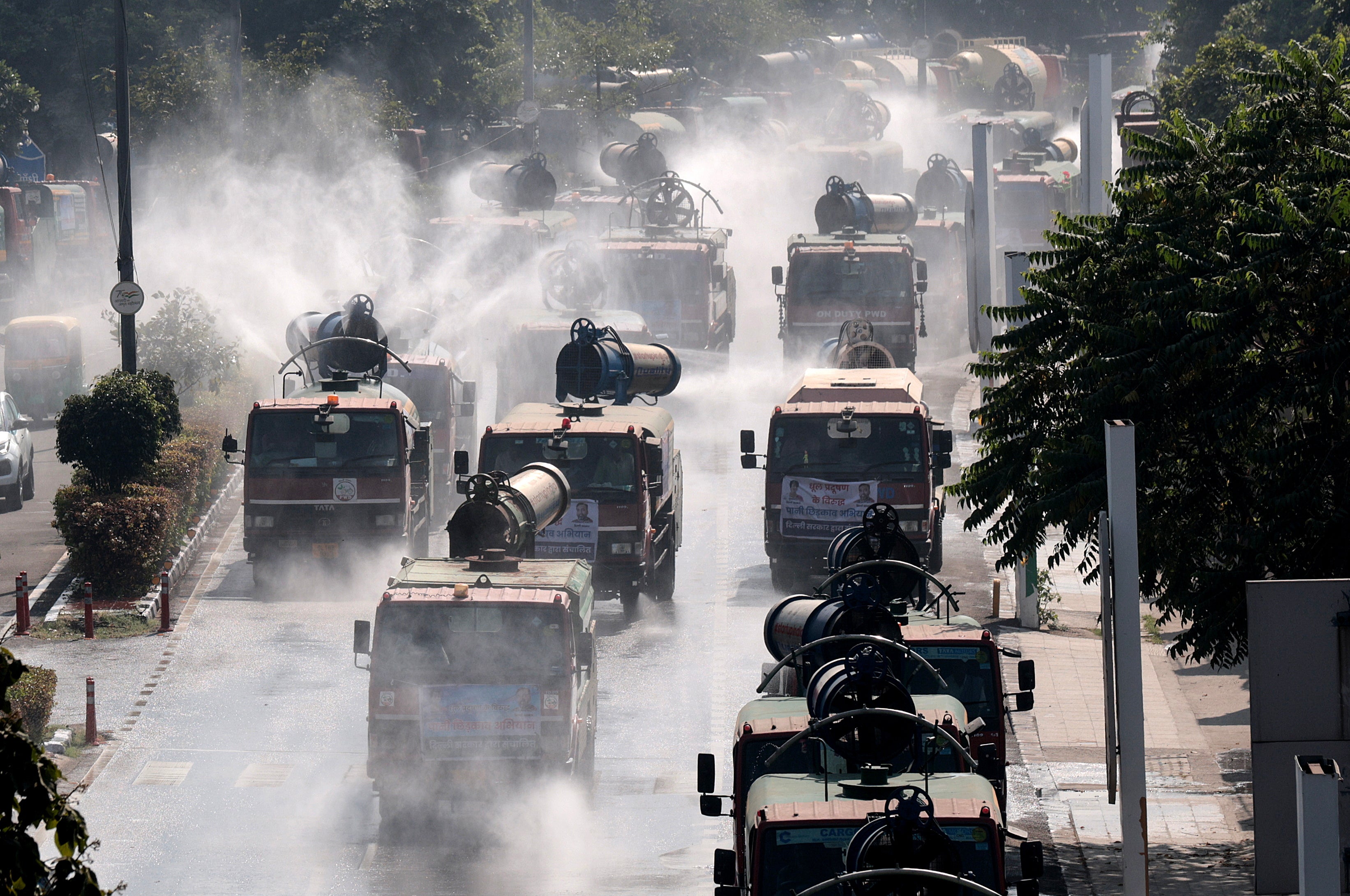 Anti-smog guns spray water mist to curb air pollution in a street of New Delhi, India, 01 November 2024