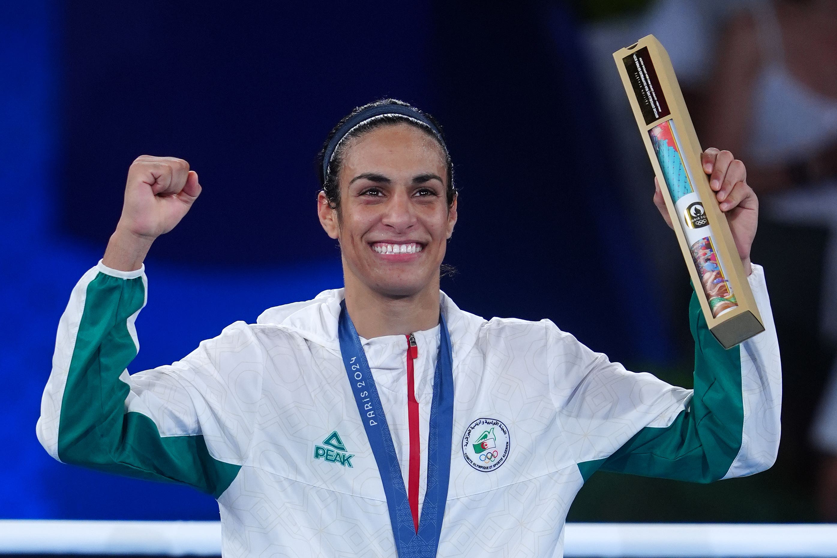 Imane Khelif celebrating her Olympic title win in Paris this summer