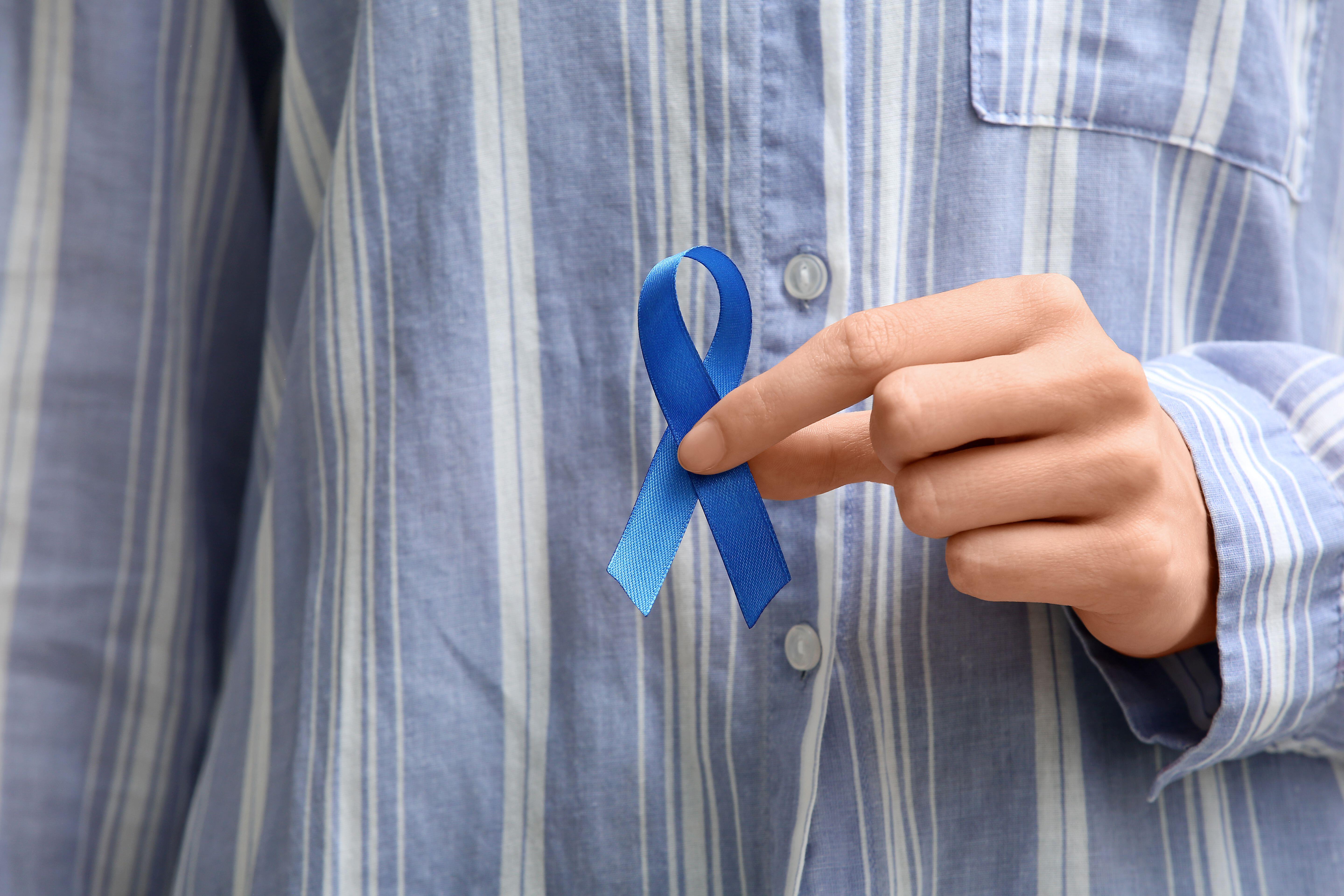 Dark blue is the official colour for colorectal cancer, and is often worn to raise awareness and show support for those affected by the disease (Alamy/PA)