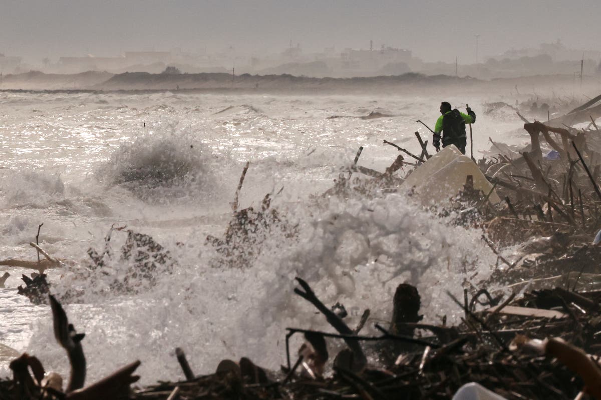 Spain floods live: Barcelona hit by ‘extreme danger’ rain warning as airport flooded