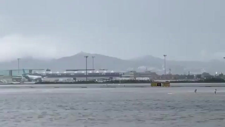 <p>Barcelona Airport runway resembles river as extreme rainfall hits.</p>