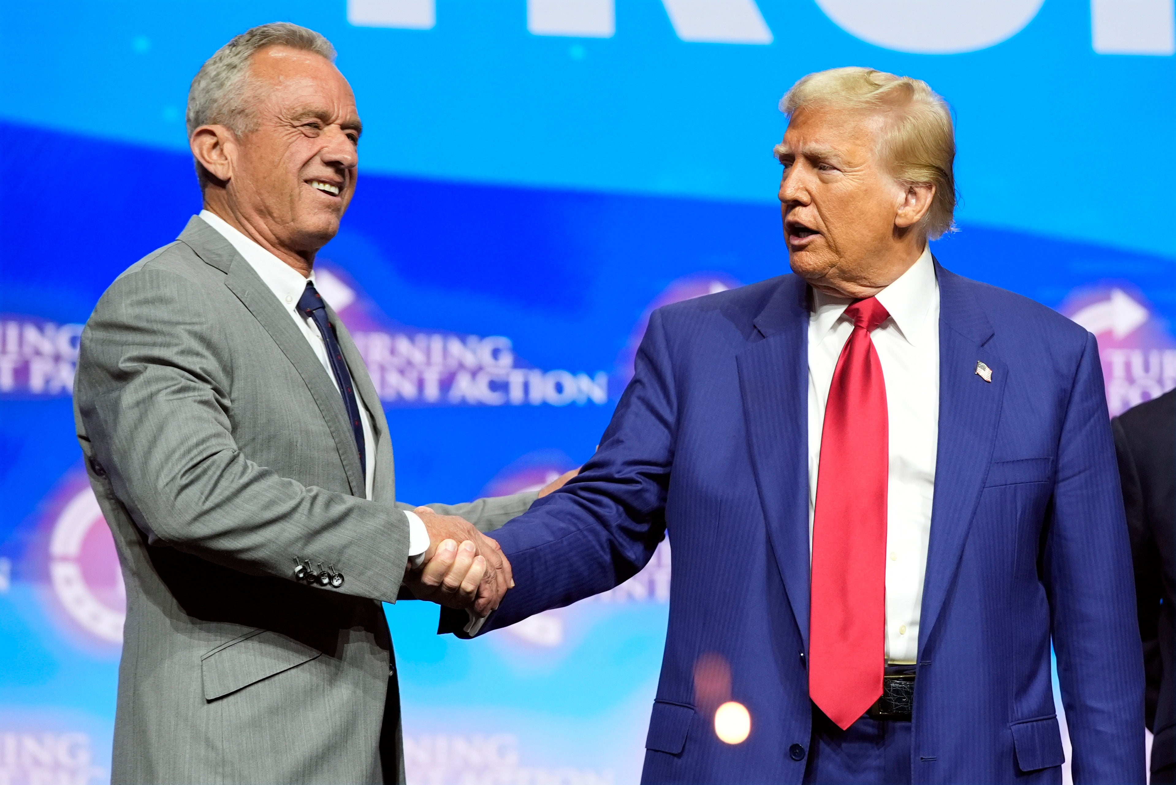 Then-Republican presidential nominee Donald Trump shakes hands with Robert F. Kennedy Jr. during a rally in Duluth, Georgia, last October. Kennedy said previously that he would ‘advise all U.S. water systems to remove fluoride from public water’ if he is confirmed to lead the nation’s top health department