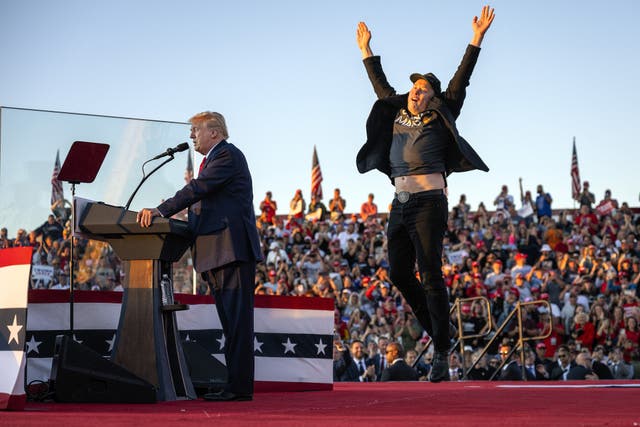 <p>Elon Musk jumps on stage as he joins former US President and convicted felon Donald Trump during a campaign rally in Butler, Pennsylvania on 5 October, 2024</p>