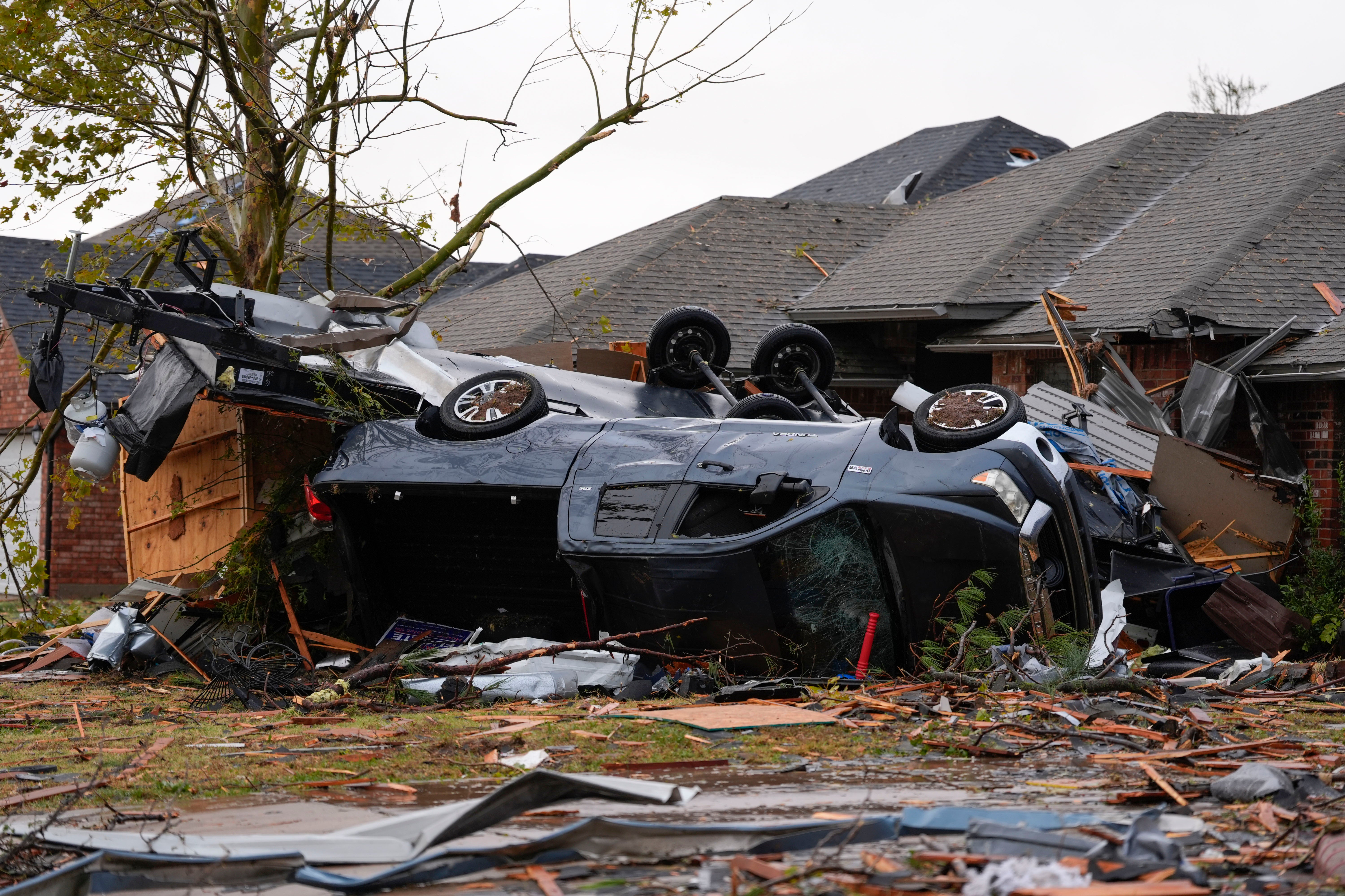 Damage from a tornado is seen along Pinewood Drive in Oklahoma City, Oklahoma, on Sunday. Multiple structures and homes were damaged during the tornadoes this past weekend.