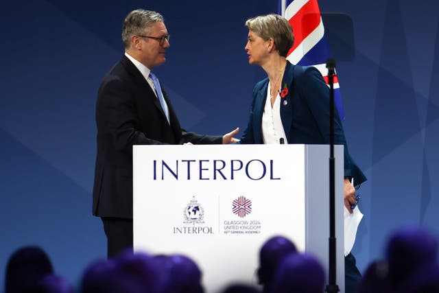 <p>Keir Starmer and Yvette Cooper at the Interpol General Assembly in Glasgow</p>